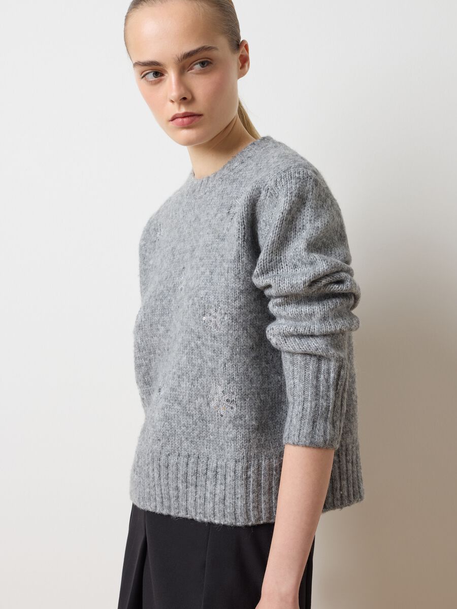 Grey oversized fit sweater with decorations_0