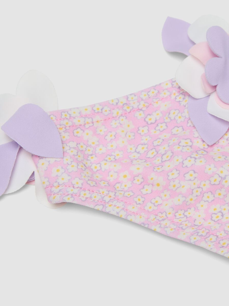 Pink stretch swim briefs with applied floral details_2