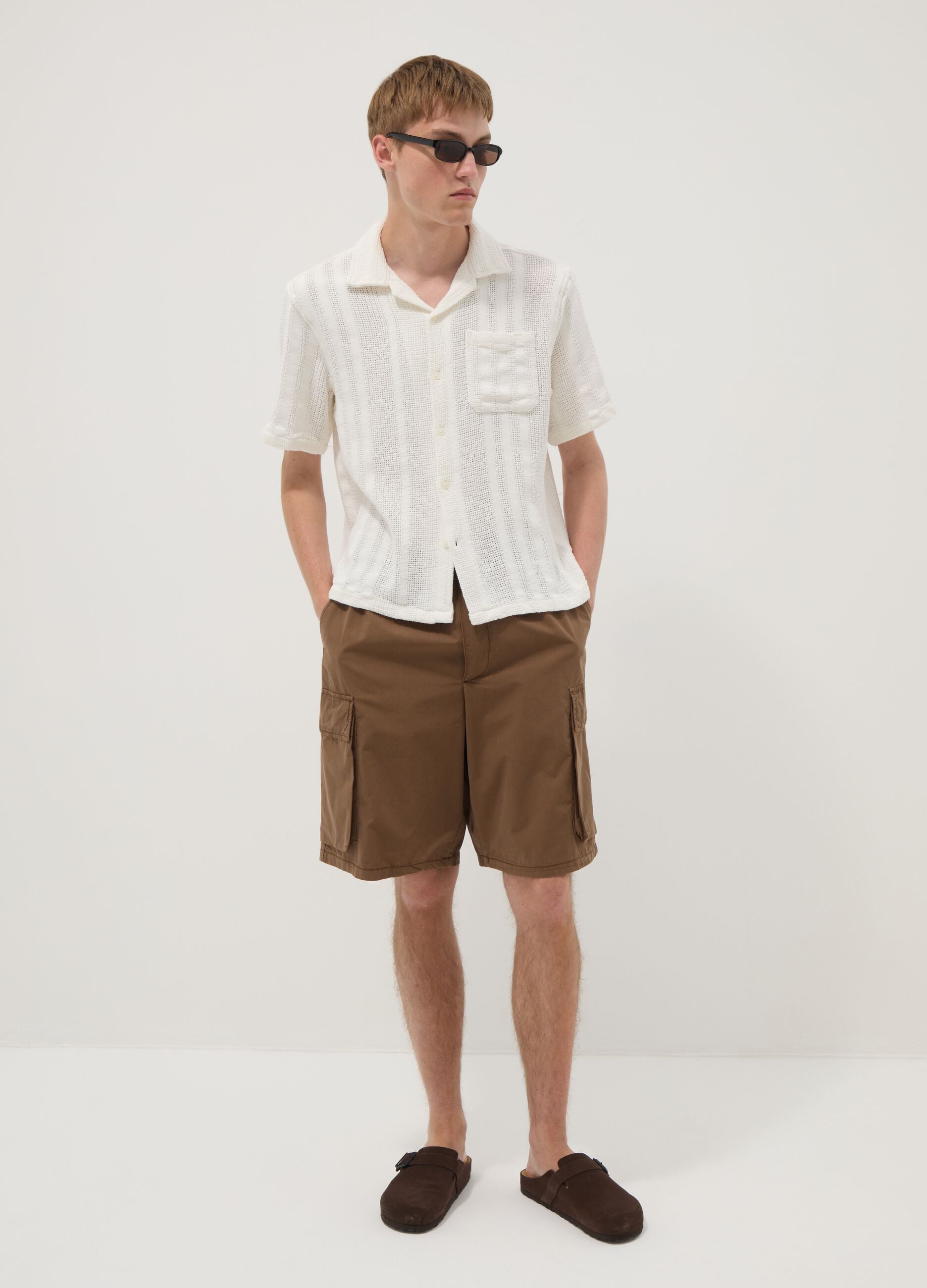 Brown cotton cargo Bermuda shorts with a baggy fit