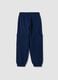 Pantaloni jogger blu in puro cotone organico con tasche cargo per bambino_1