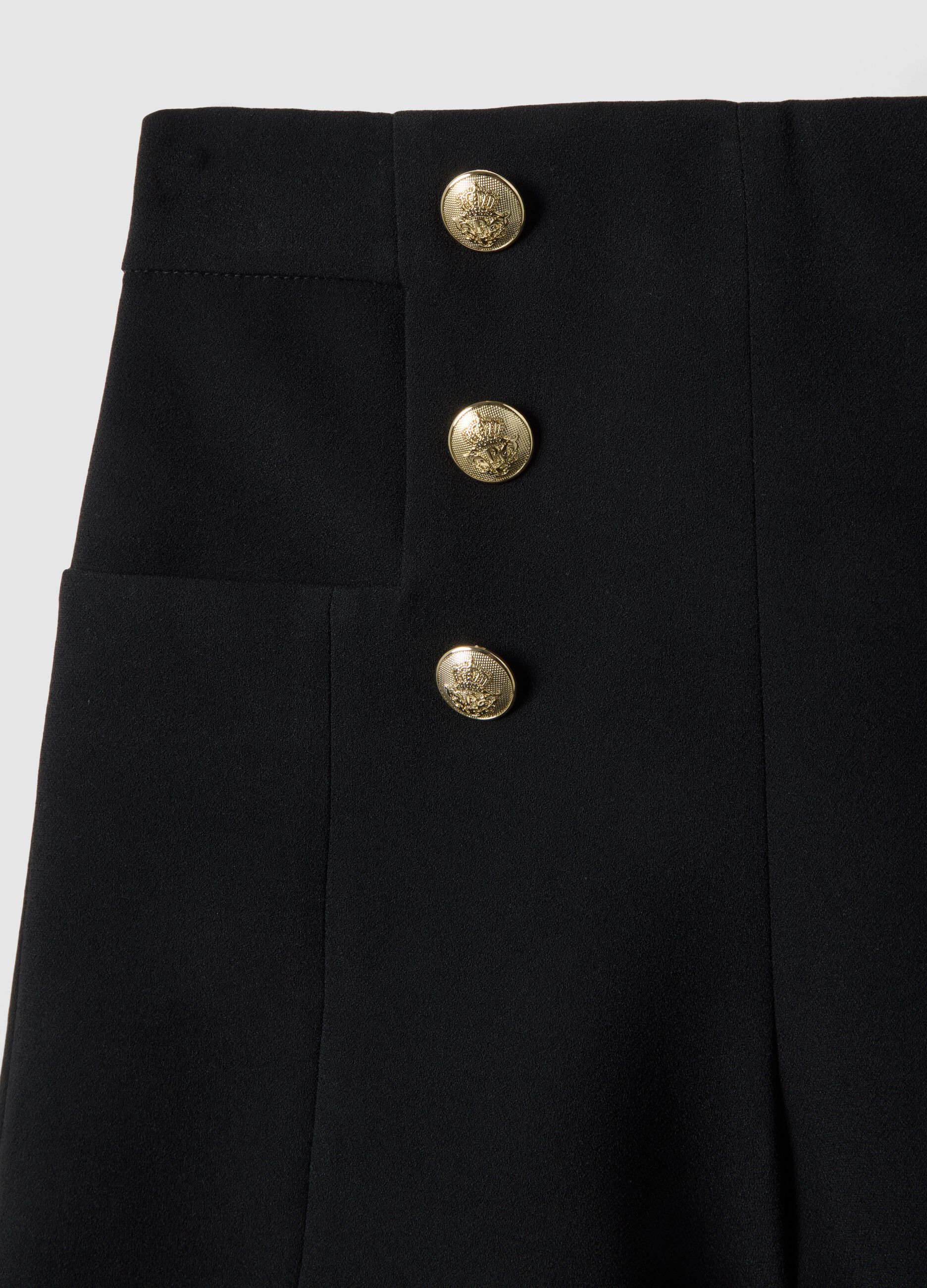 Black regular fit shorts with high waist and gold buttons