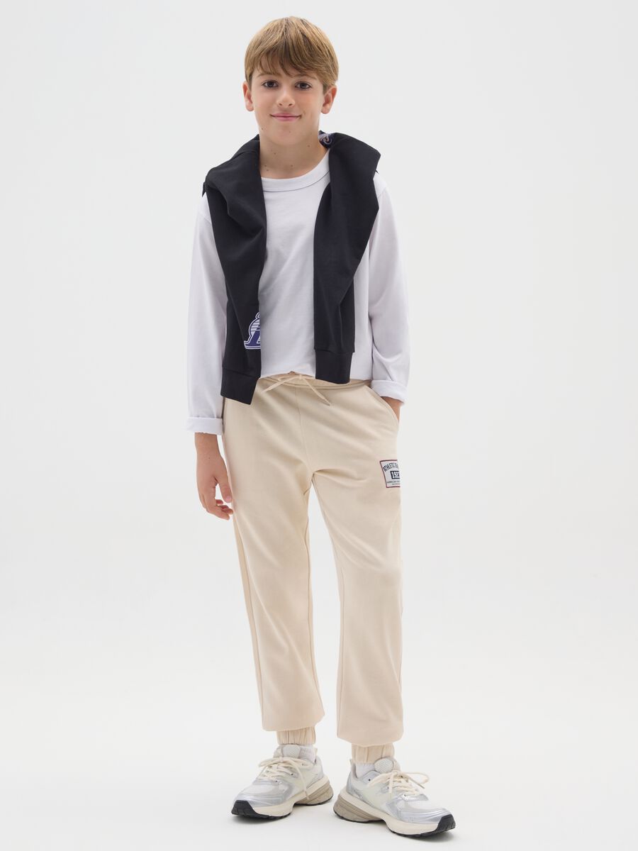 Pantaloni jogger da ragazzo in puro cotone beige regular fit_0