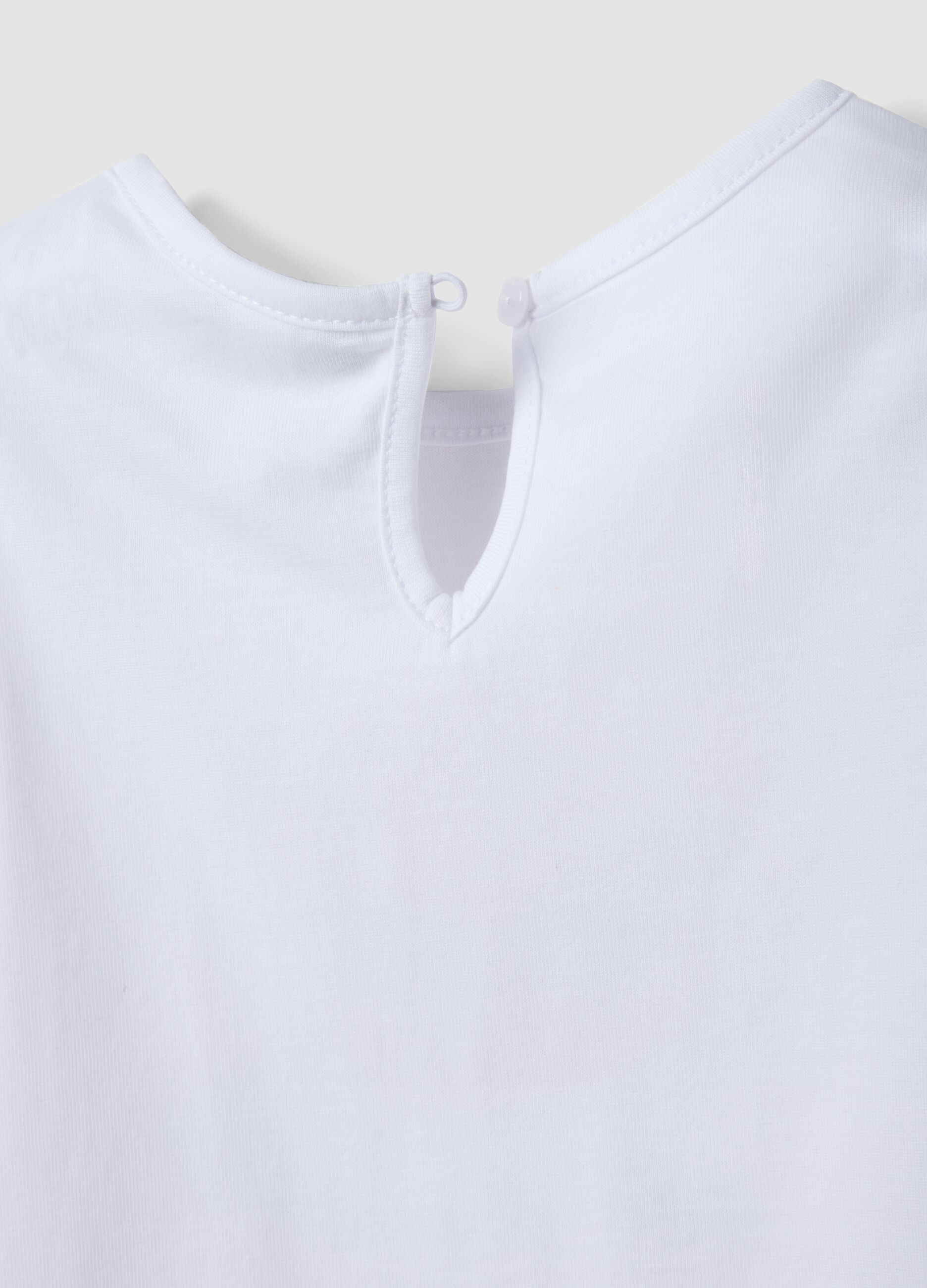 White organic cotton girls&rsquo; tank top with print and frills