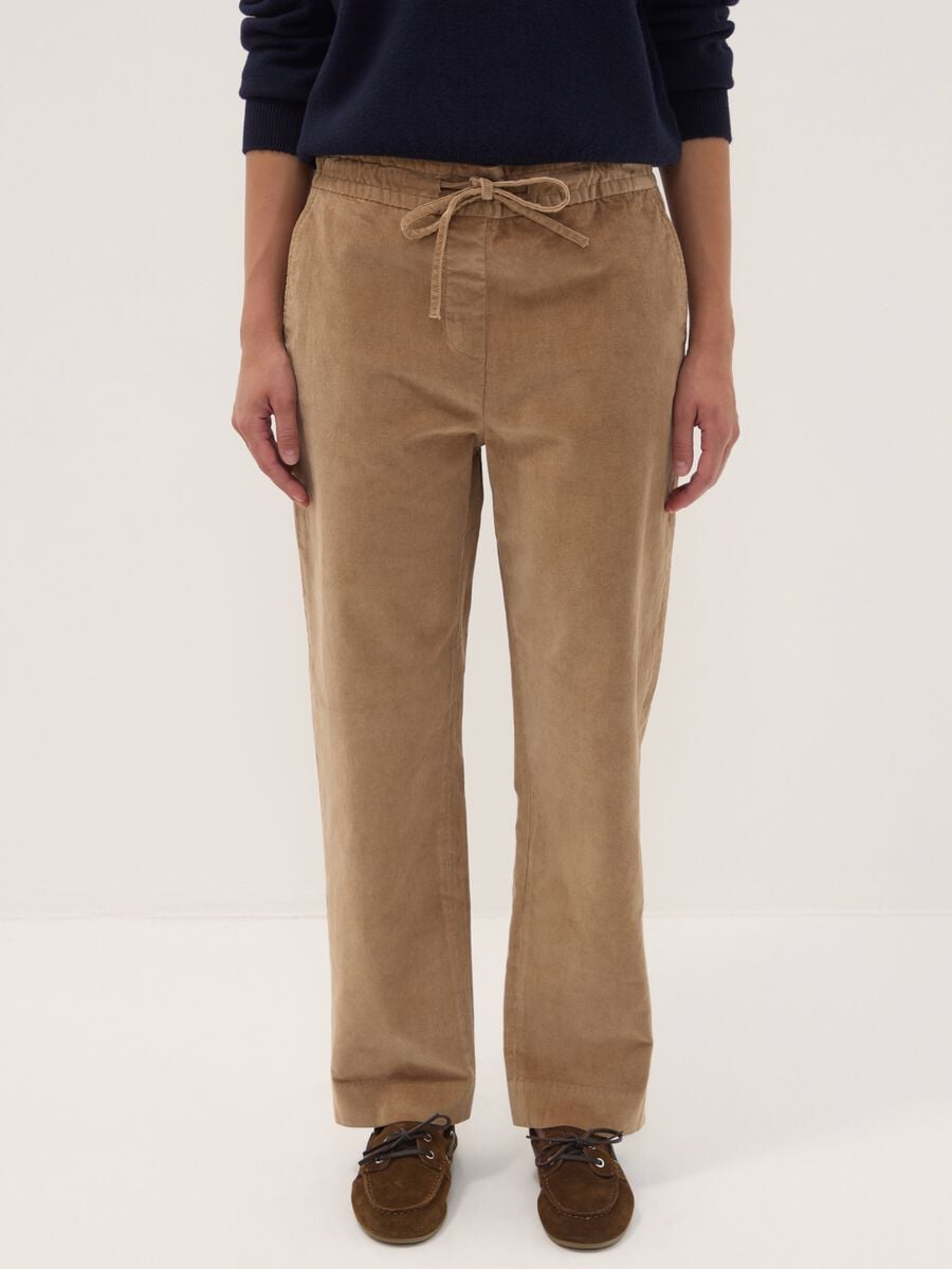 Pantaloni beige in cotone elasticizzato a coste con vita elasticizzata_1