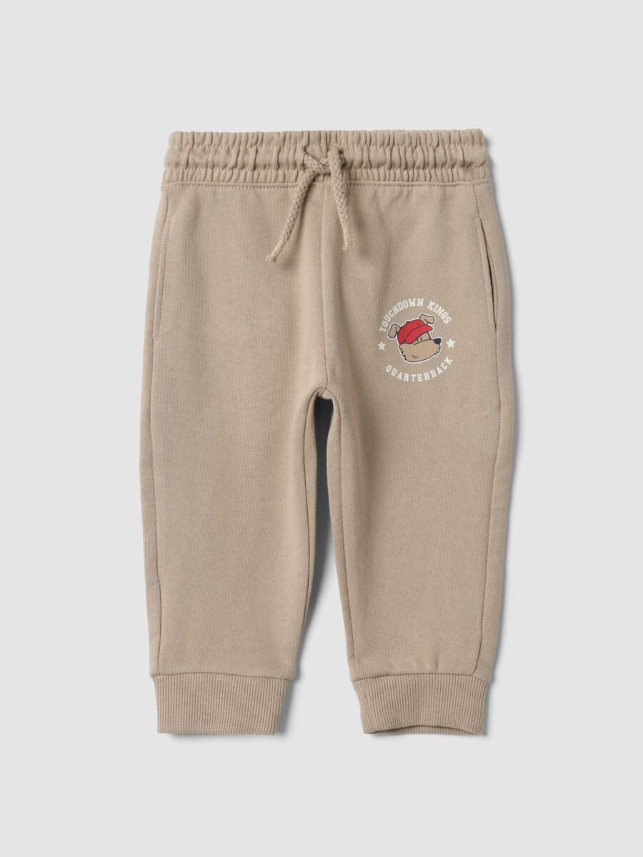 Pantaloni jogger beige in puro cotone con stampa cagnolino per bimbo_0