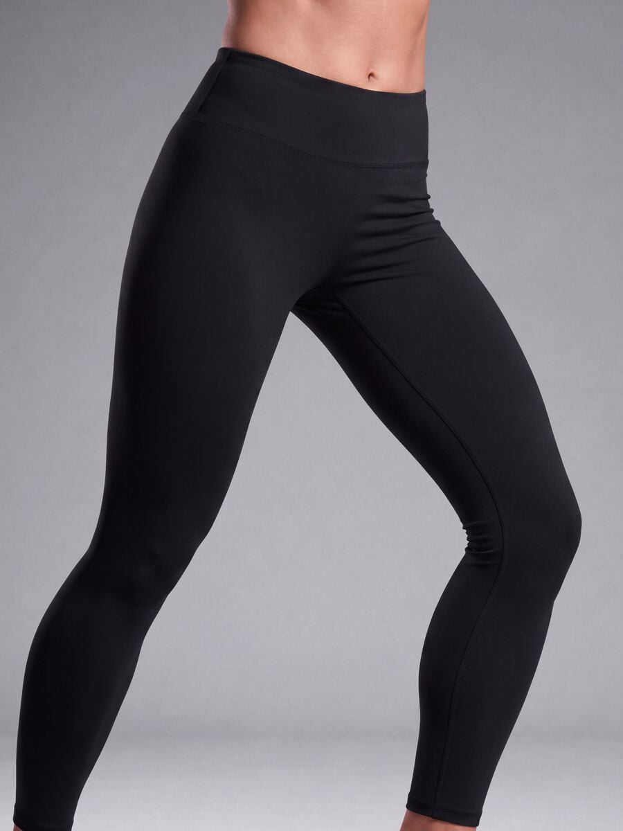 Leggings neri in tessuto elasticizzato a vita alta_4