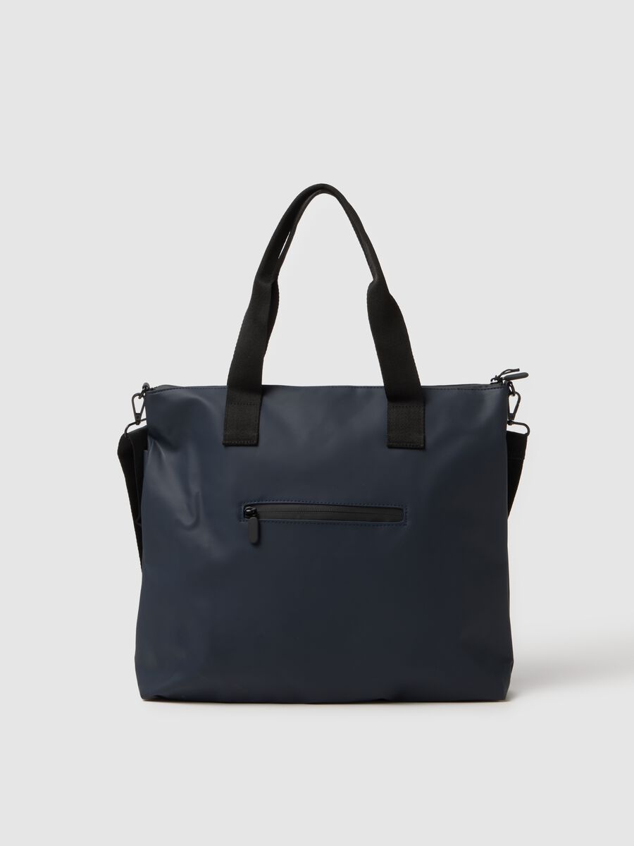 Blue shopper bag with multiple compartments and adjustable shoulder strap_0