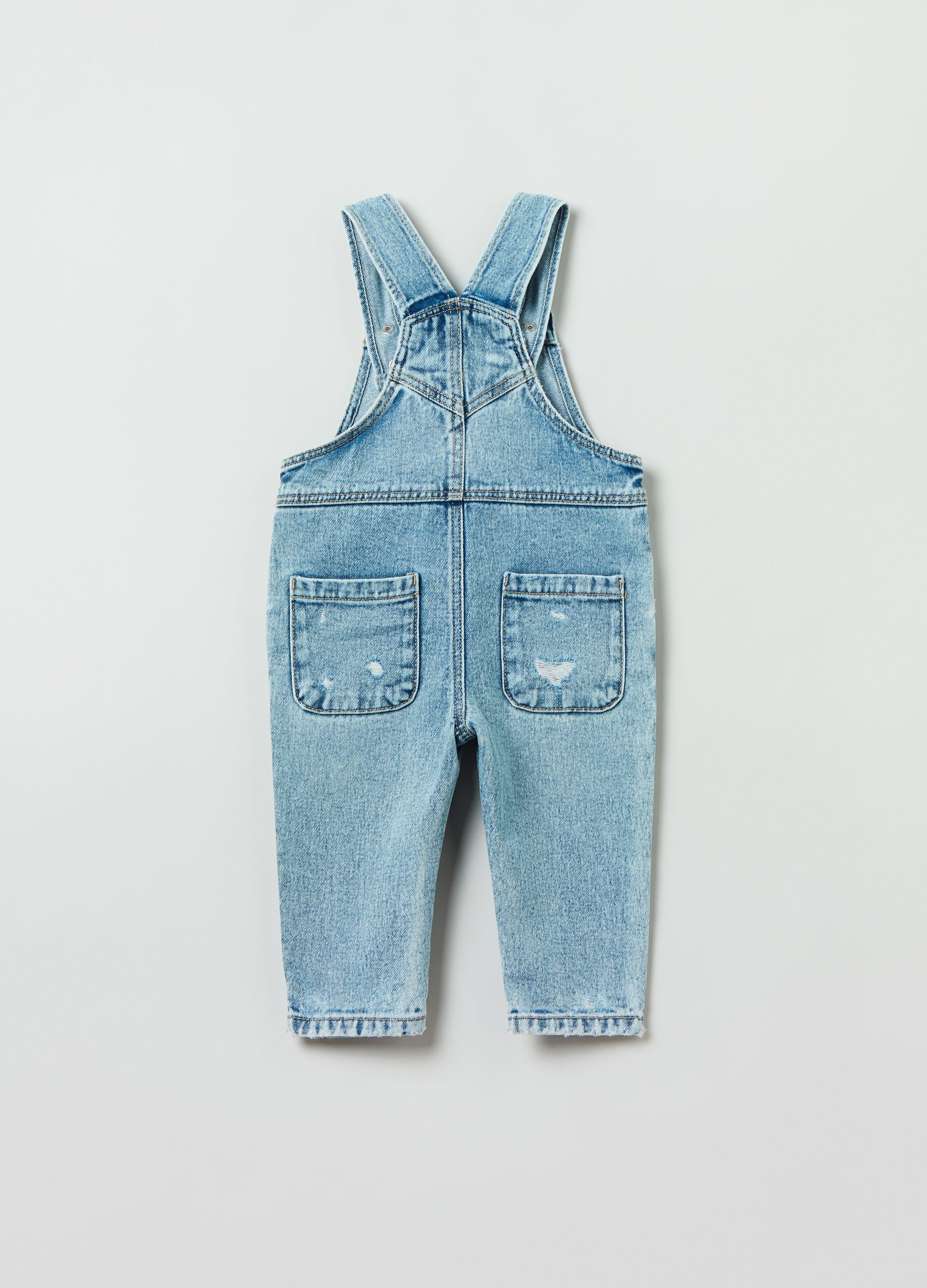 Salopette in denim con abrasioni_1