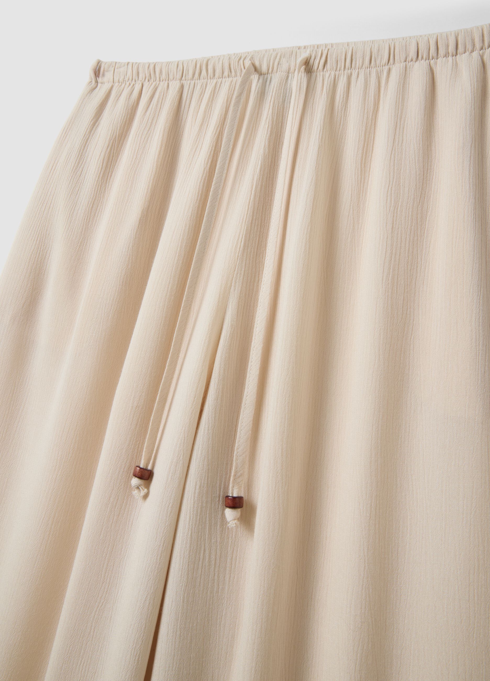 Beige palazzo trousers in pure viscose
