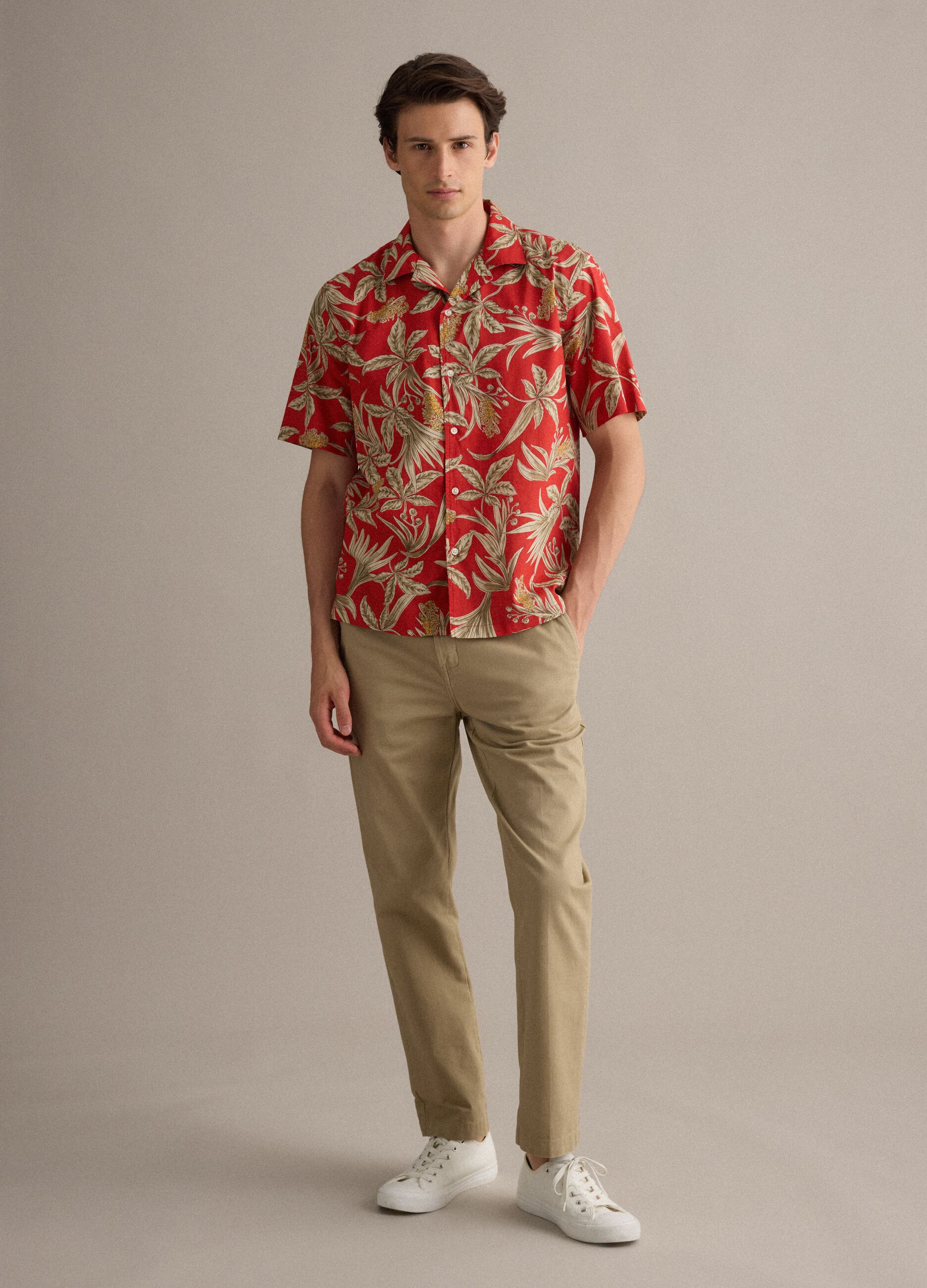 Red organic cotton shirt with tropical print