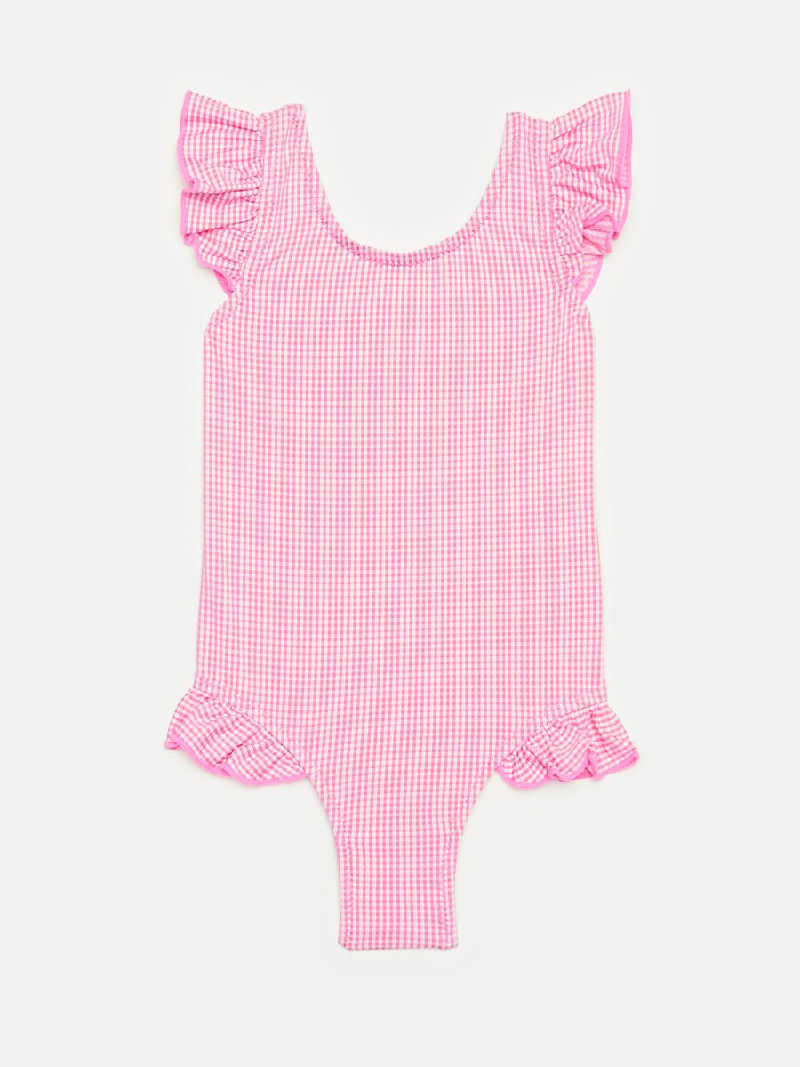 One-piece swimsuit with gingham pattern and flounce_0