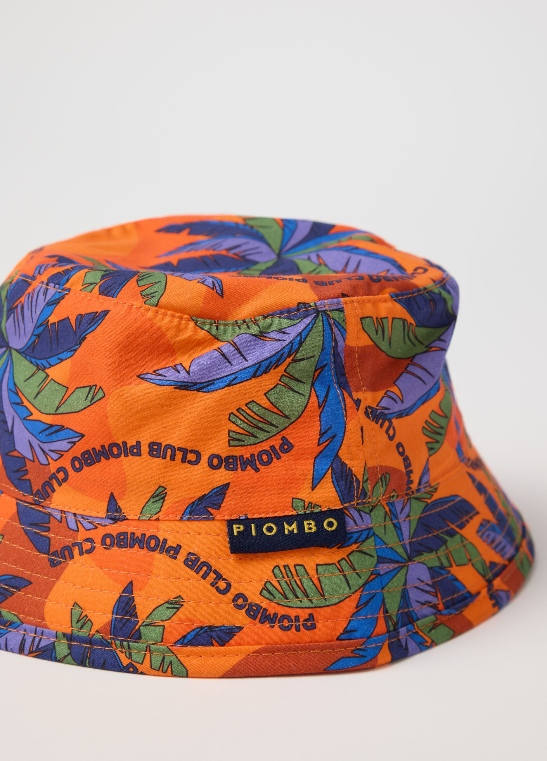 Orange fishing hat with palms print