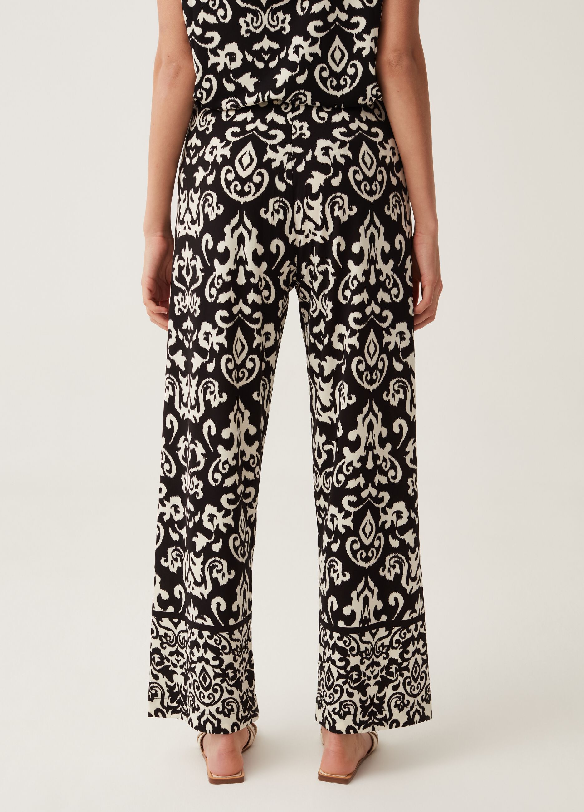 Wide-leg trousers with all-over heritage print