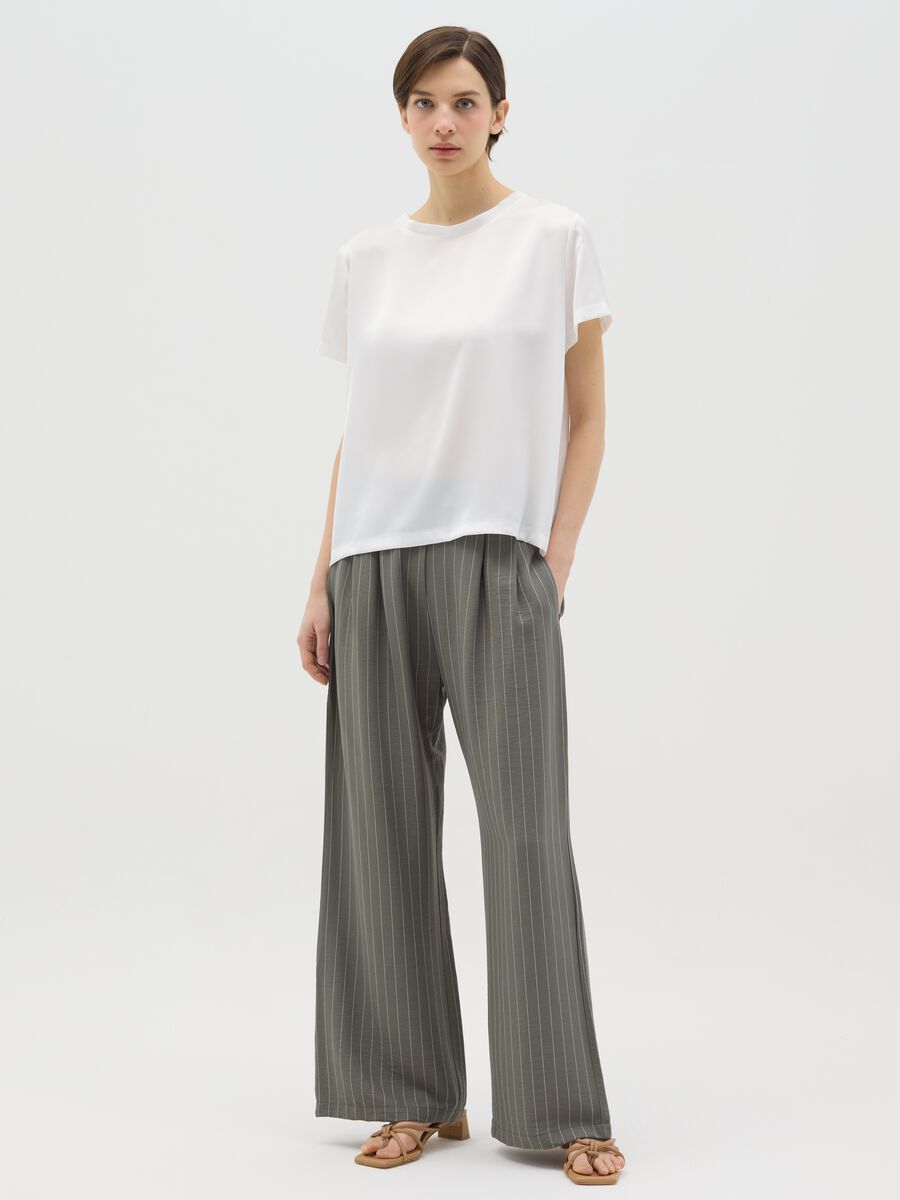 Green palazzo trousers with striped pattern_0