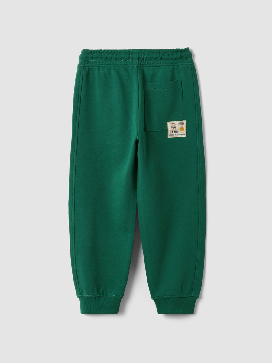 Pantaloni jogger verdi in puro cotone con vita elasticizzata per bambino_1