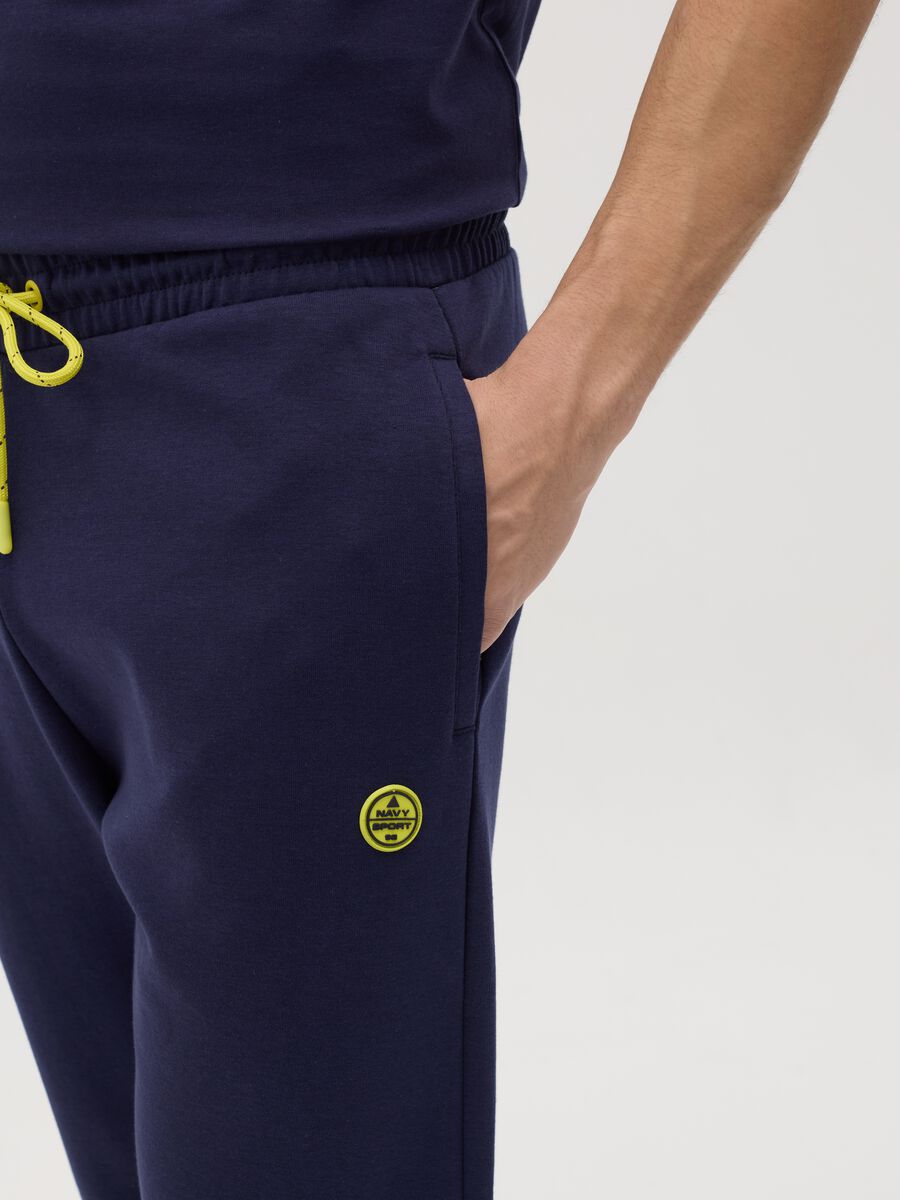 Blue joggers in fleece with logo_2
