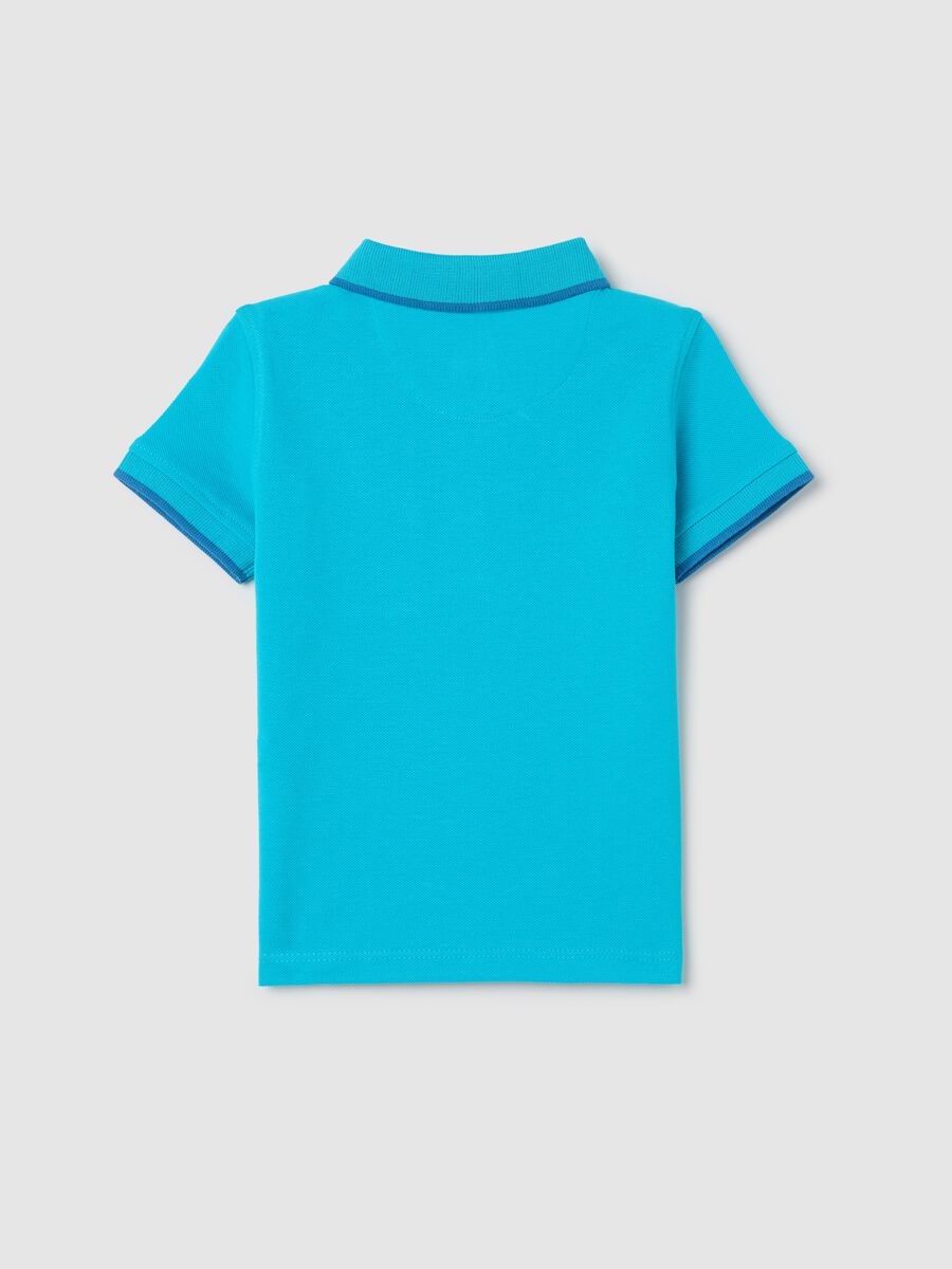 Light blue polo shirt in piquet with hippopotamus surfer_1