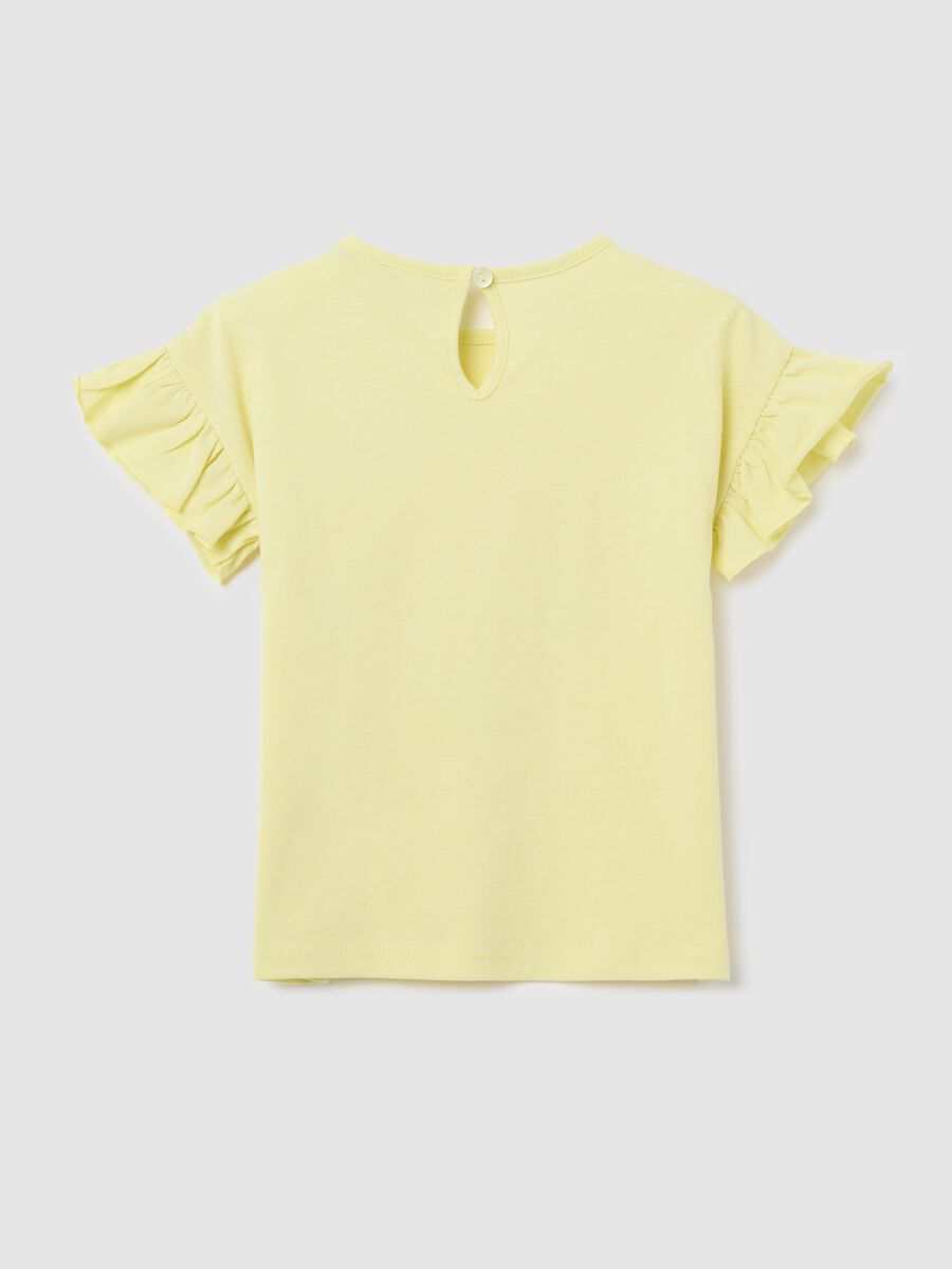 Yellow T-shirt in cotton with print and flounce_1