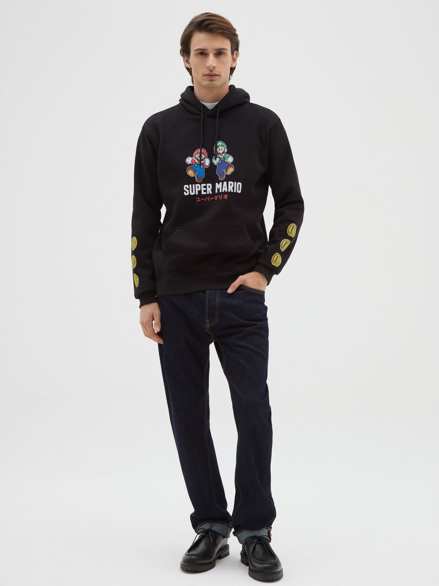 Felpa in misto cotone nera con cappuccio e stampa_1