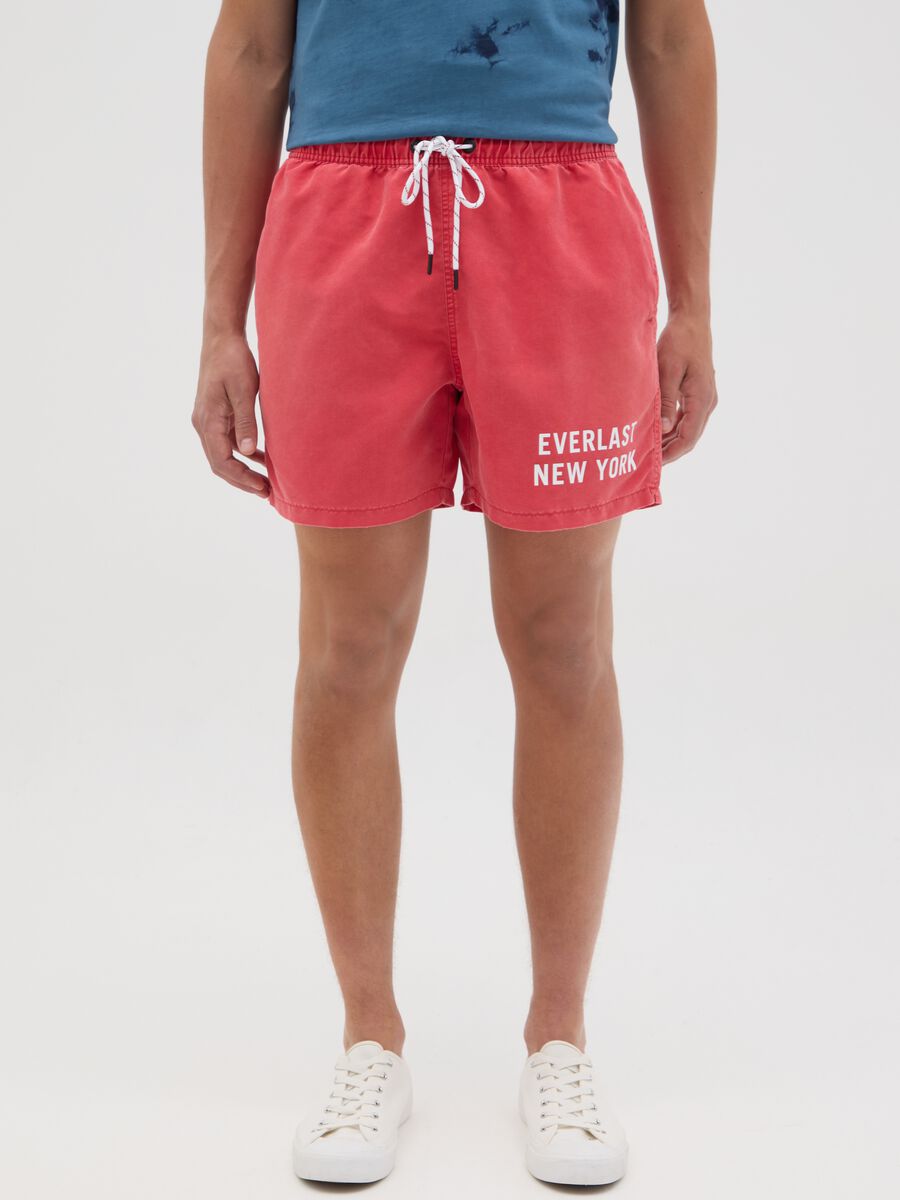 Red swimming trunks with logo print_1