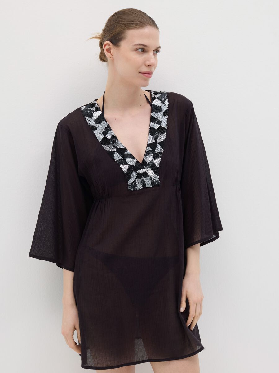 Black beach cover-up with decorative edging_1