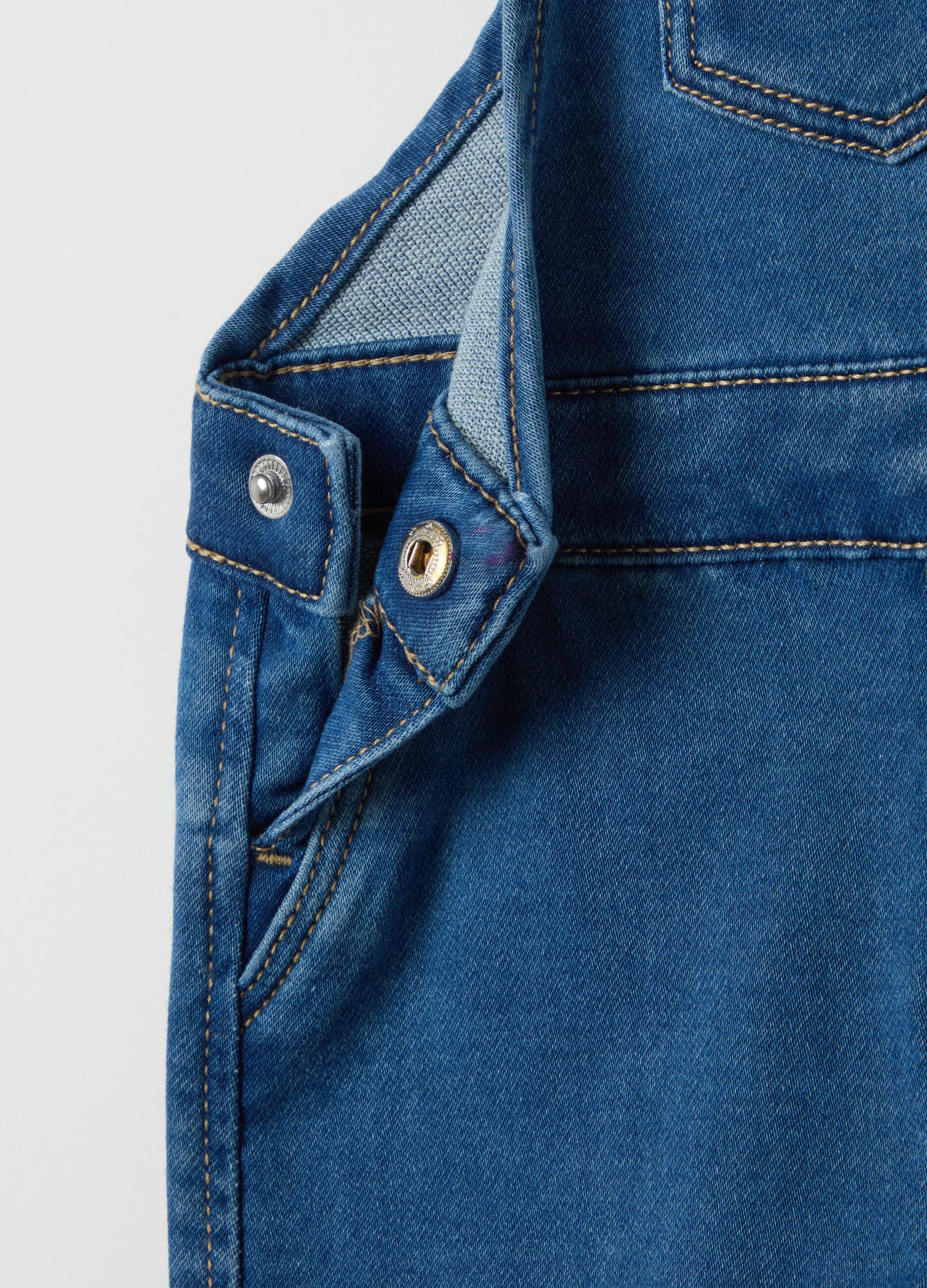 Denim dungarees with pocket