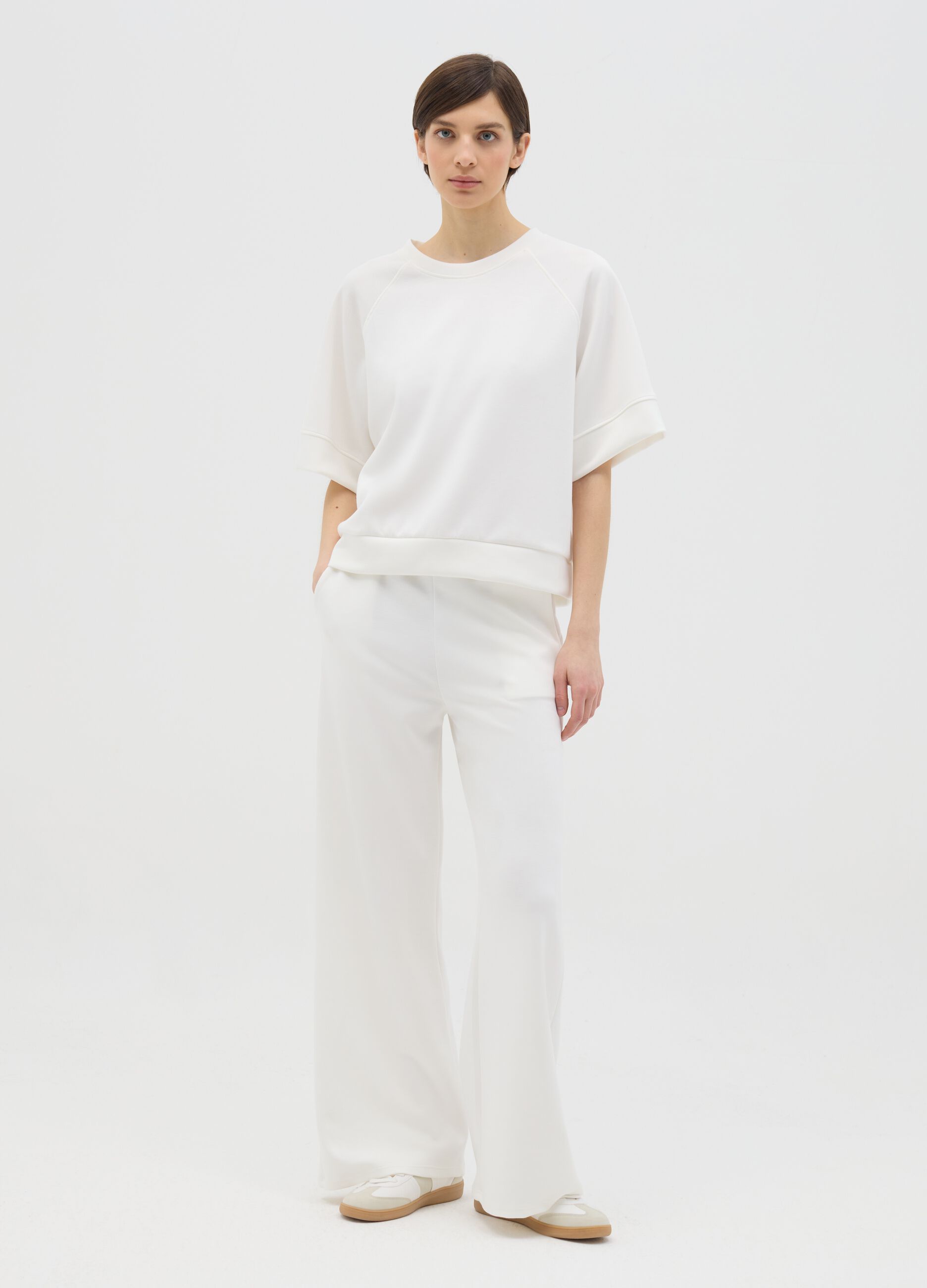 White palazzo trousers in stretch fabric