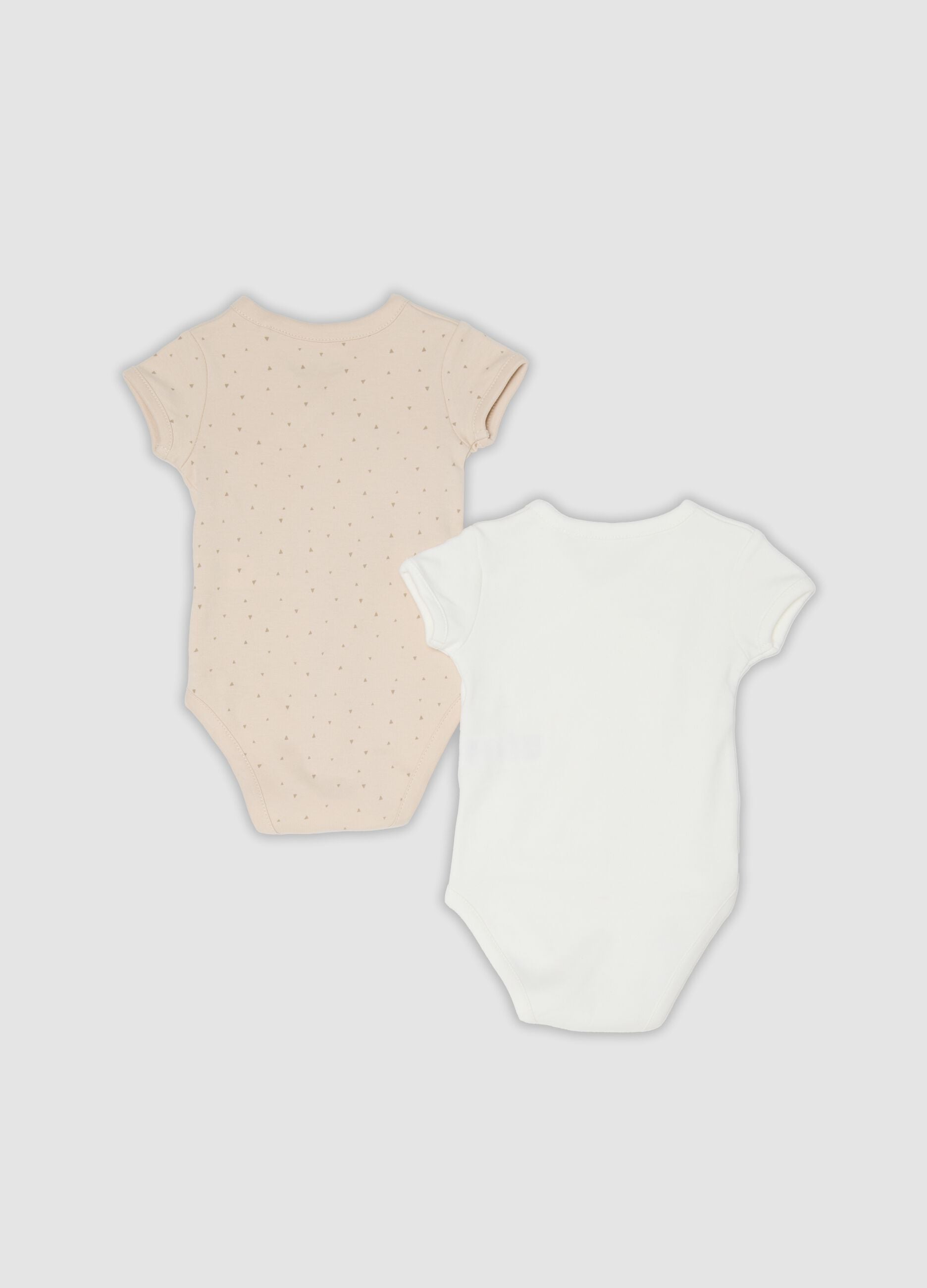 Bipack di body beige e bianco in cotone organico a maniche corte per bimbo