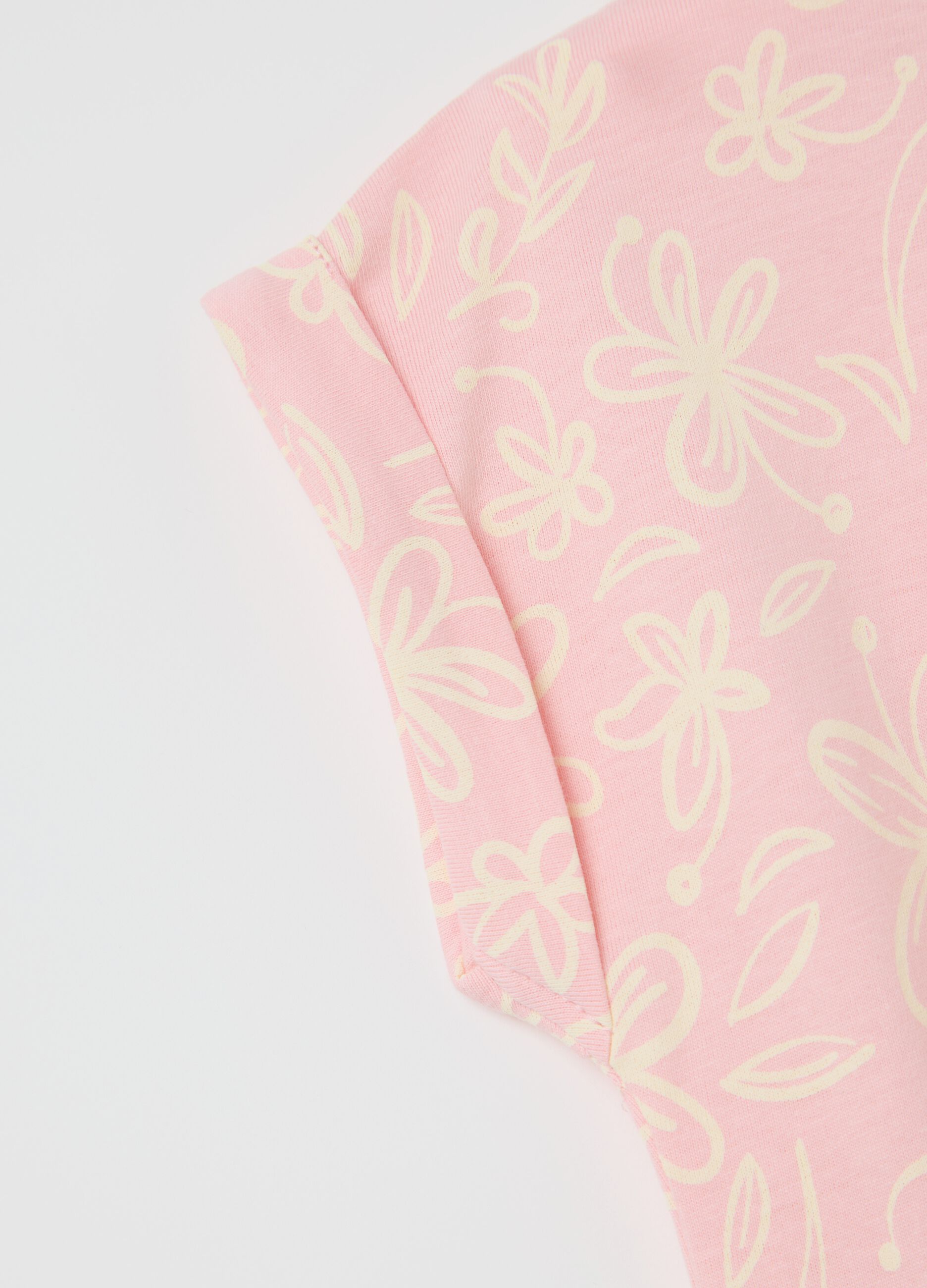 Abito senza maniche rosa con motivi floreali