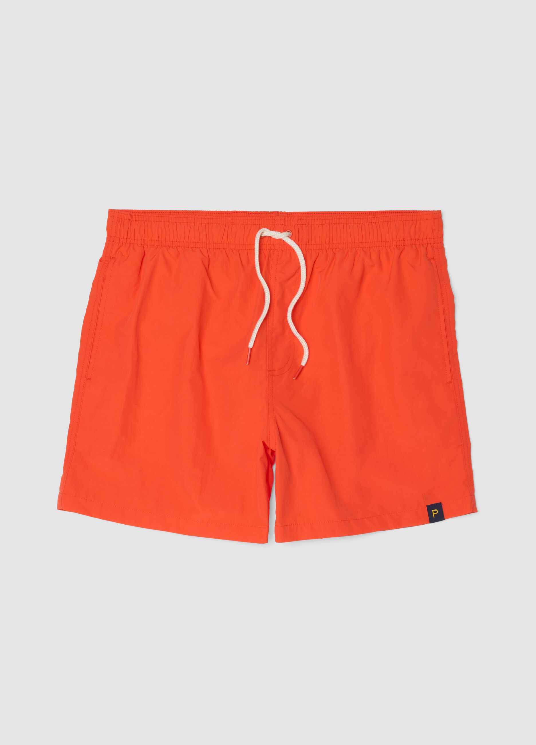 Orange swim shorts with elasticated waistband and drawstring