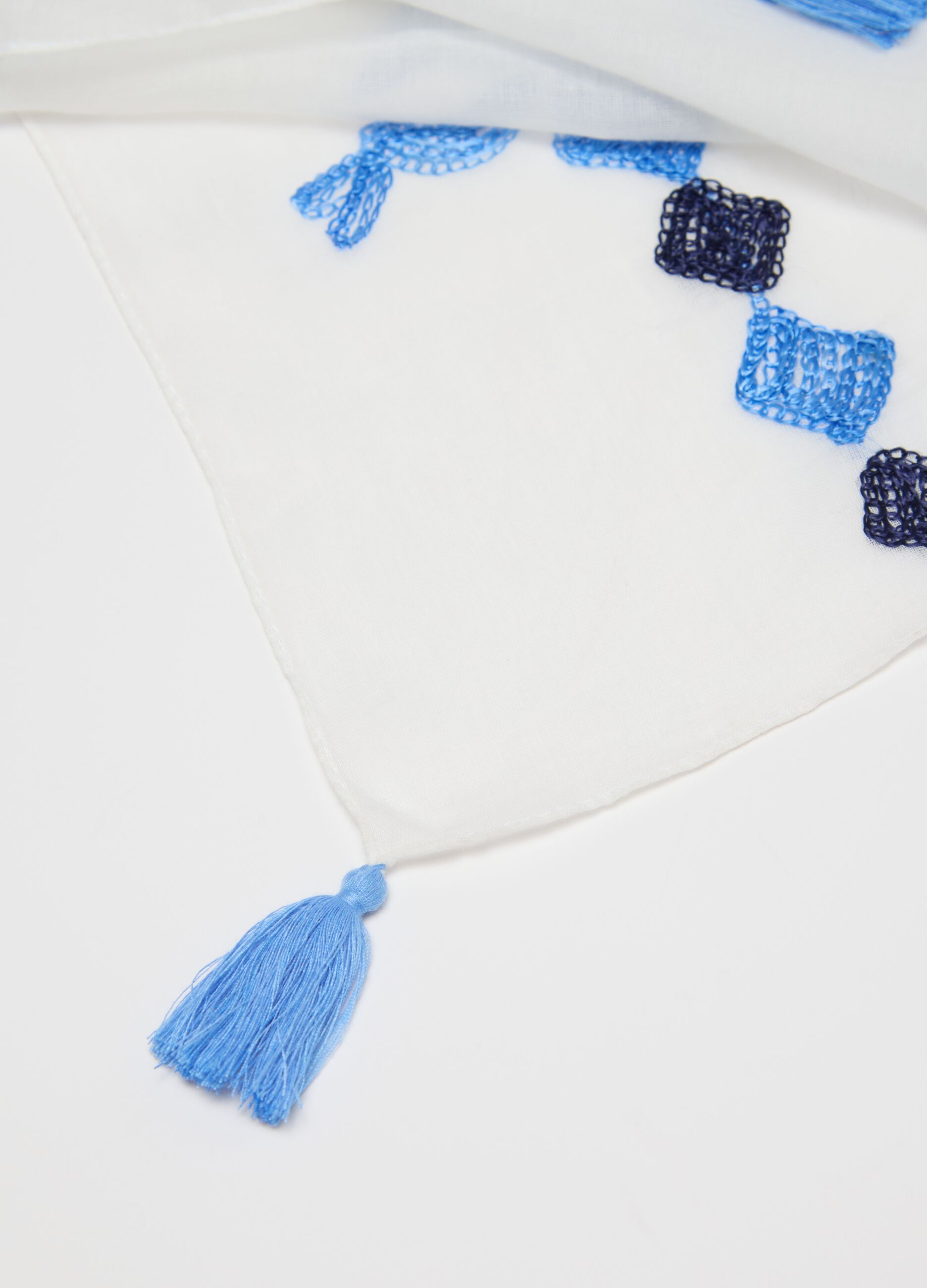 White and blue scarf with embroidery and tassels