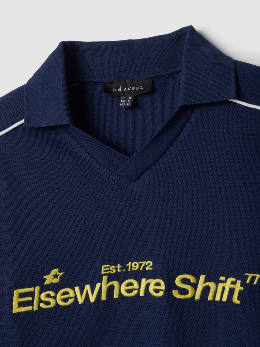 Polo blu in puro cotone con stampa e collo classico_1