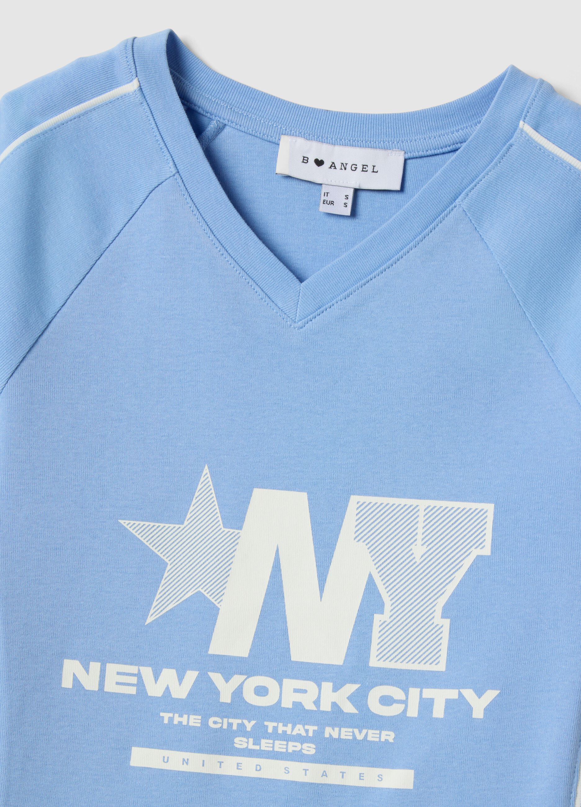 T-shirt in puro cotone azzurra slim fit con collo a V e stampa