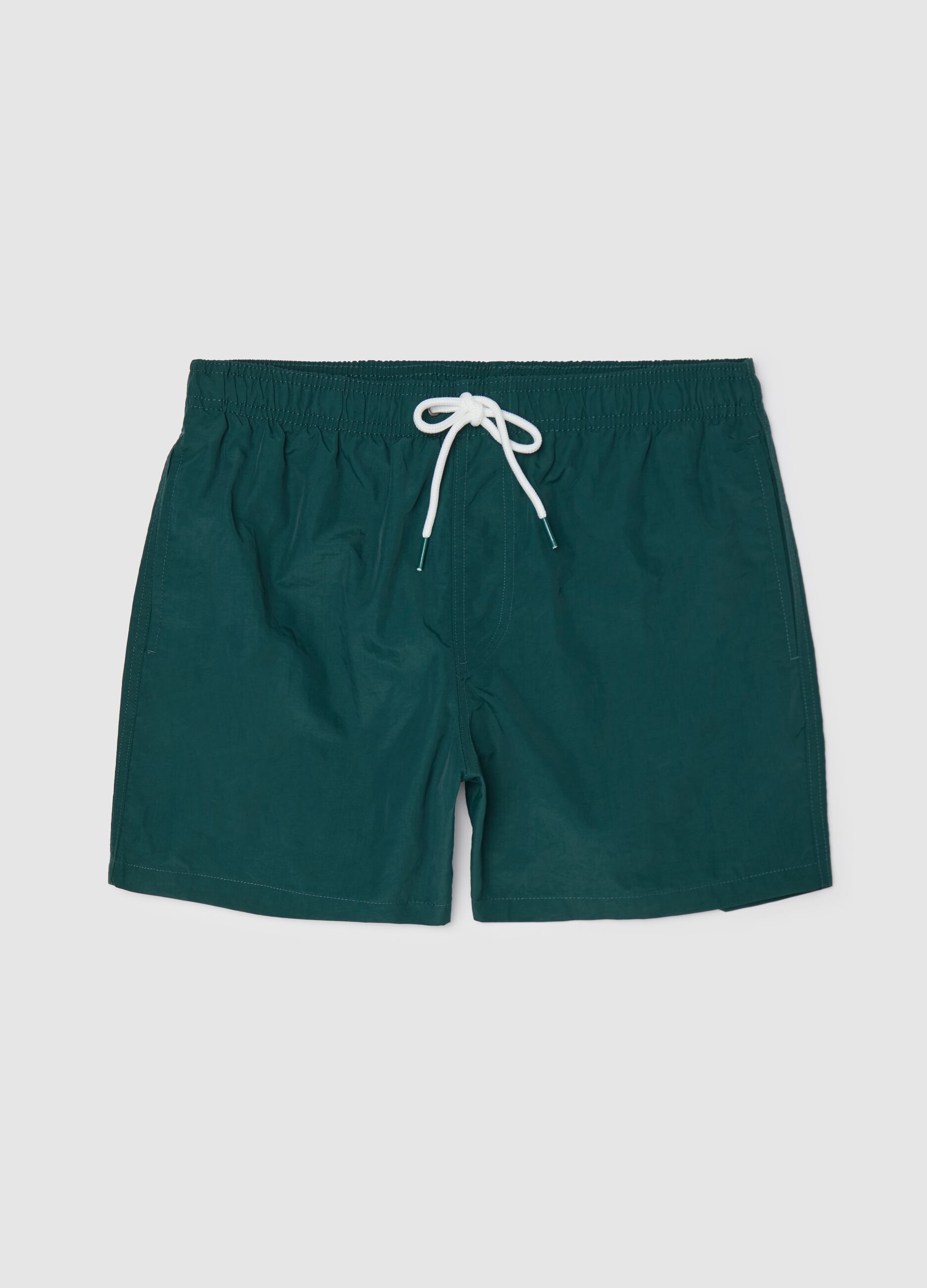Green mixed fabric swim shorts