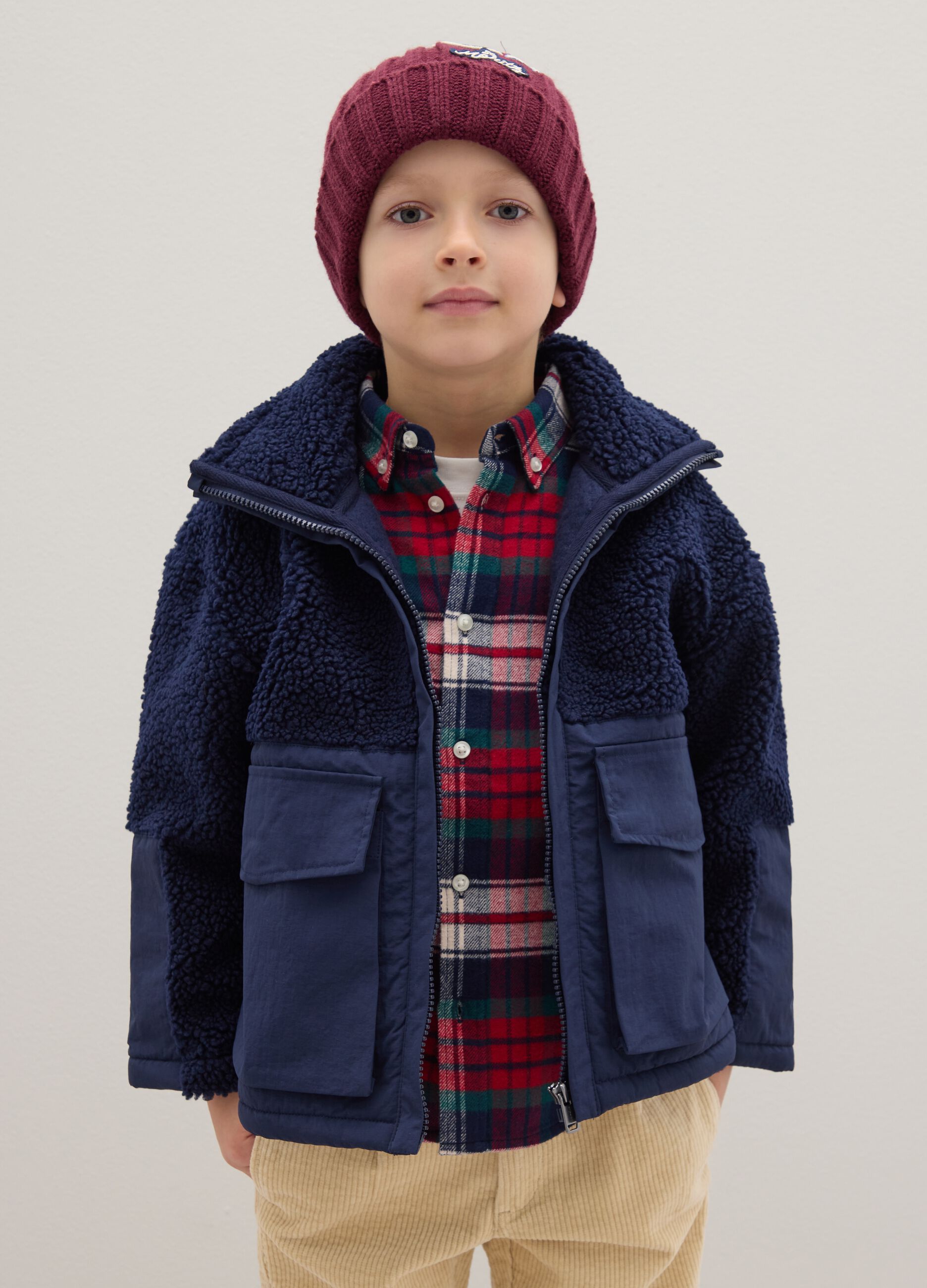 Boys' blue jacket with high collar in regular fit sherpa