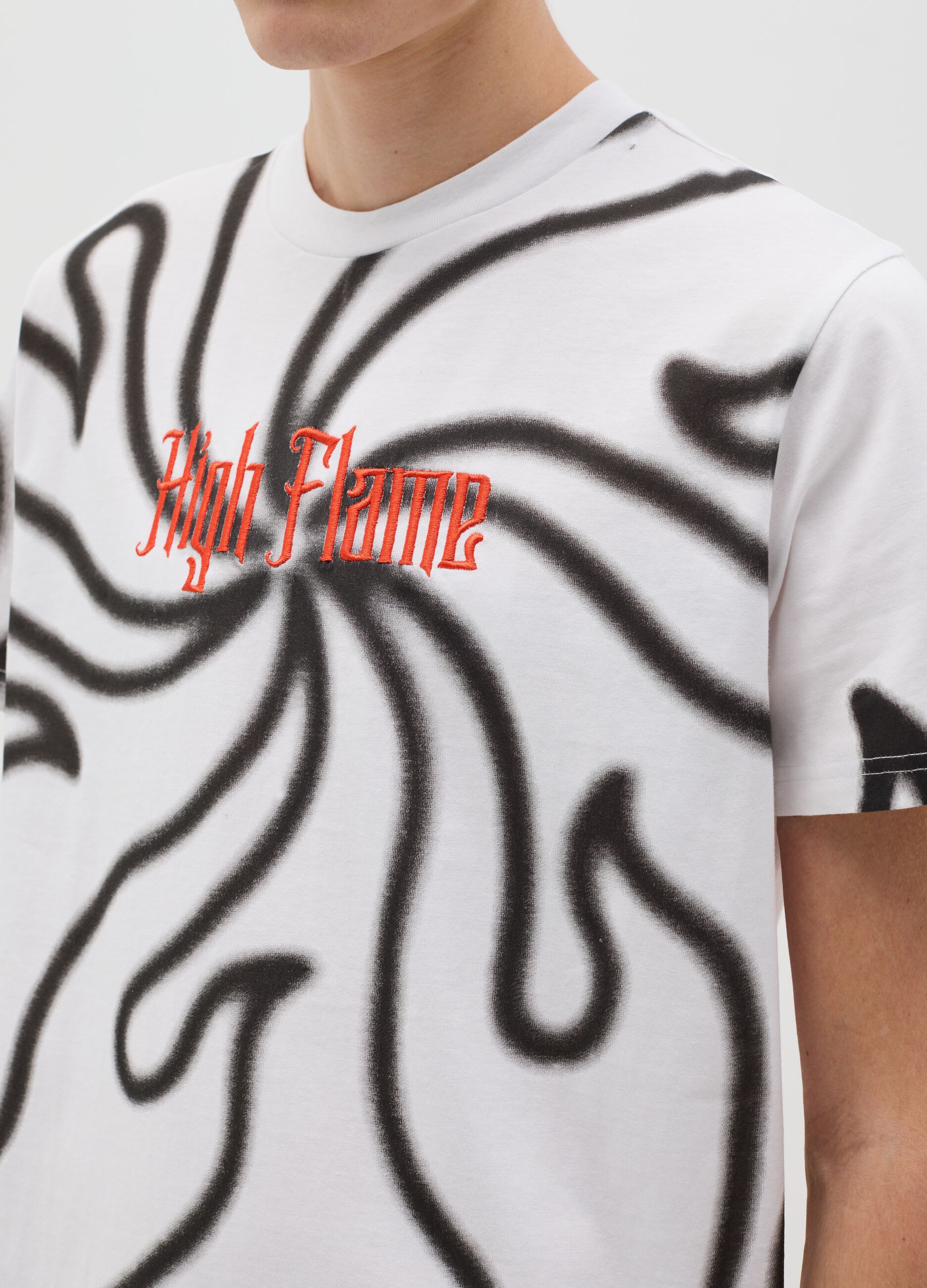 White and black T-shirt with flames print