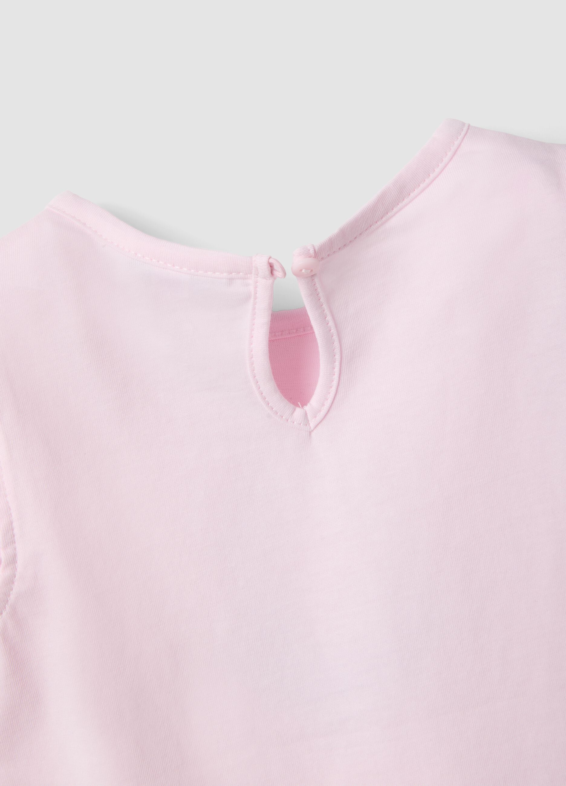 Pink organic cotton girls&rsquo; tank top with print and ruffles