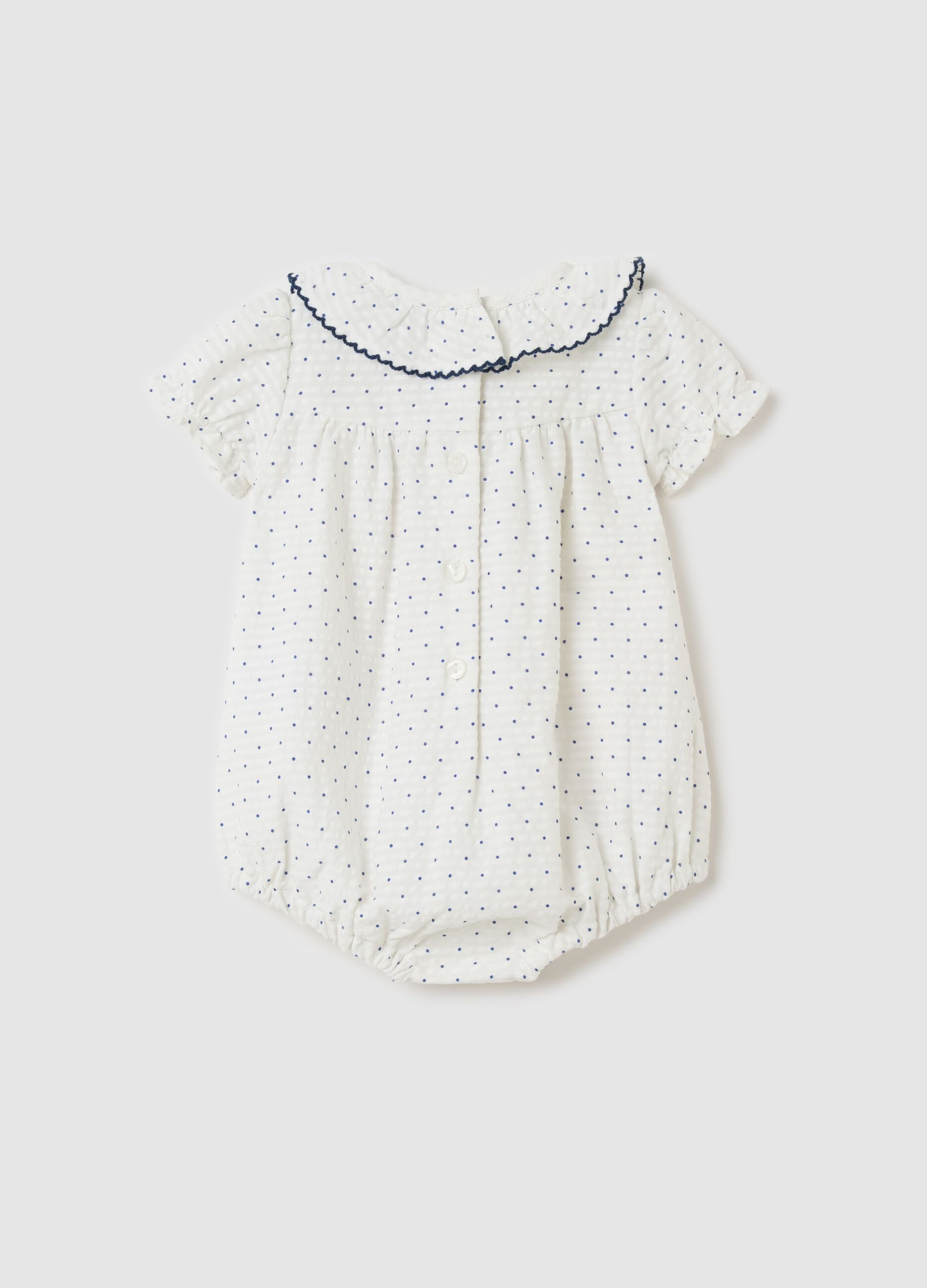 Romper suit with striped motif polka dot pattern
