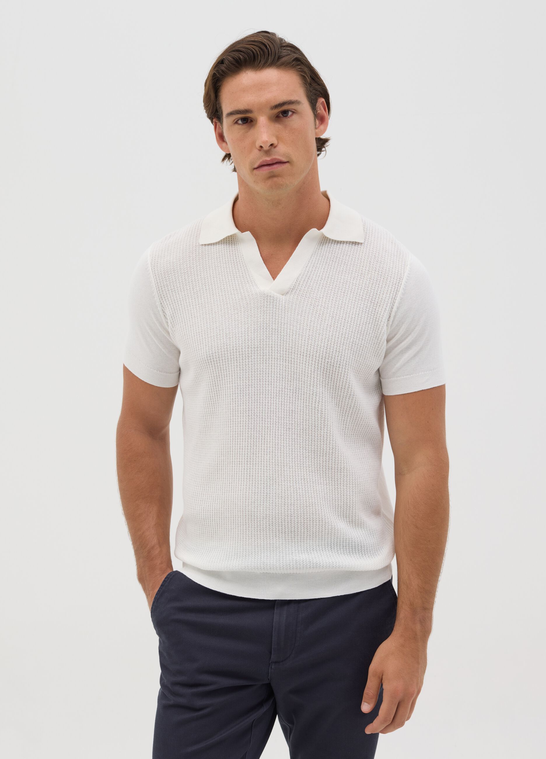 Polo bianca in maglia con trama jacquard