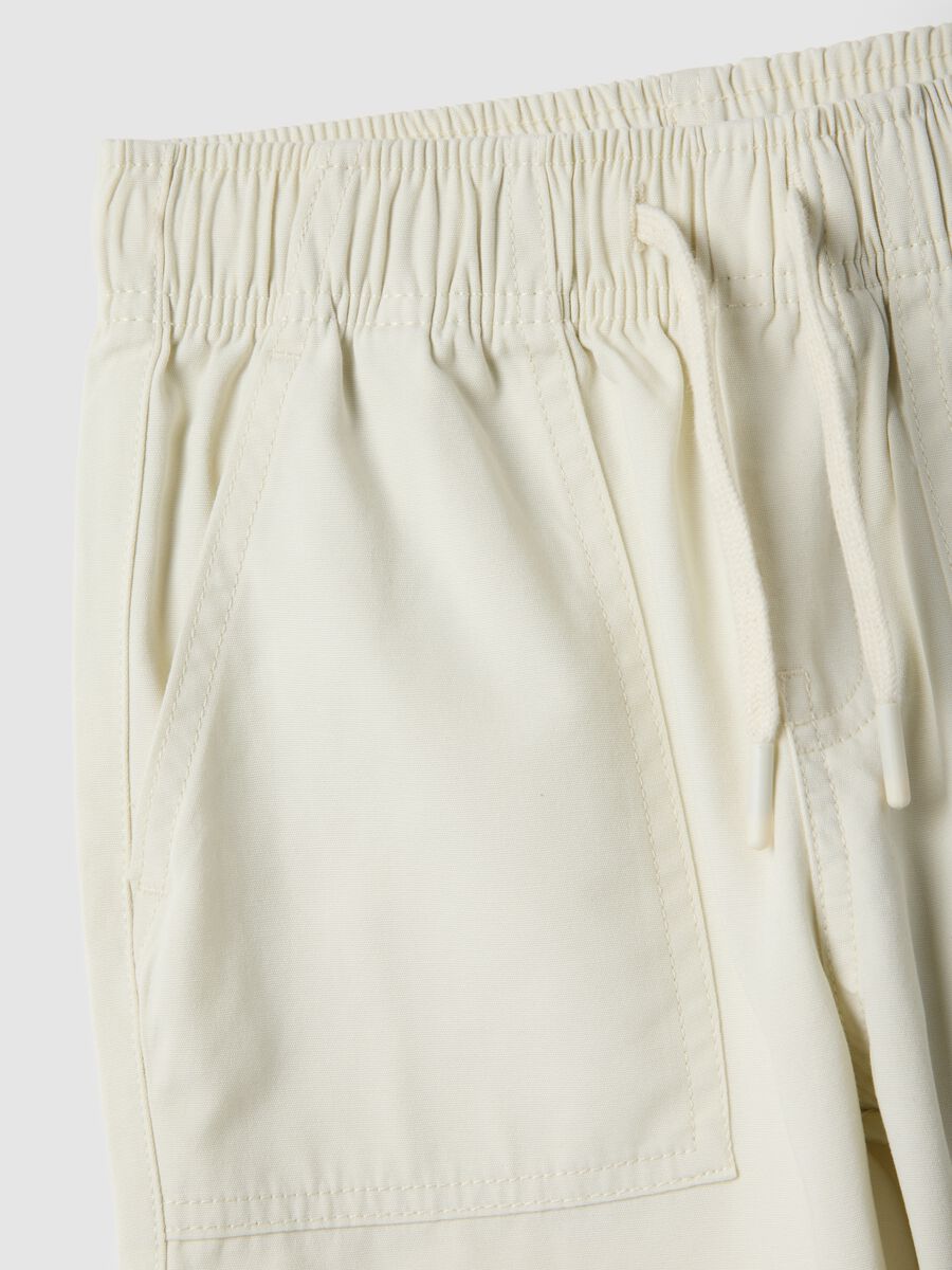 Children's straight jogger trousers in pure beige cotton_2