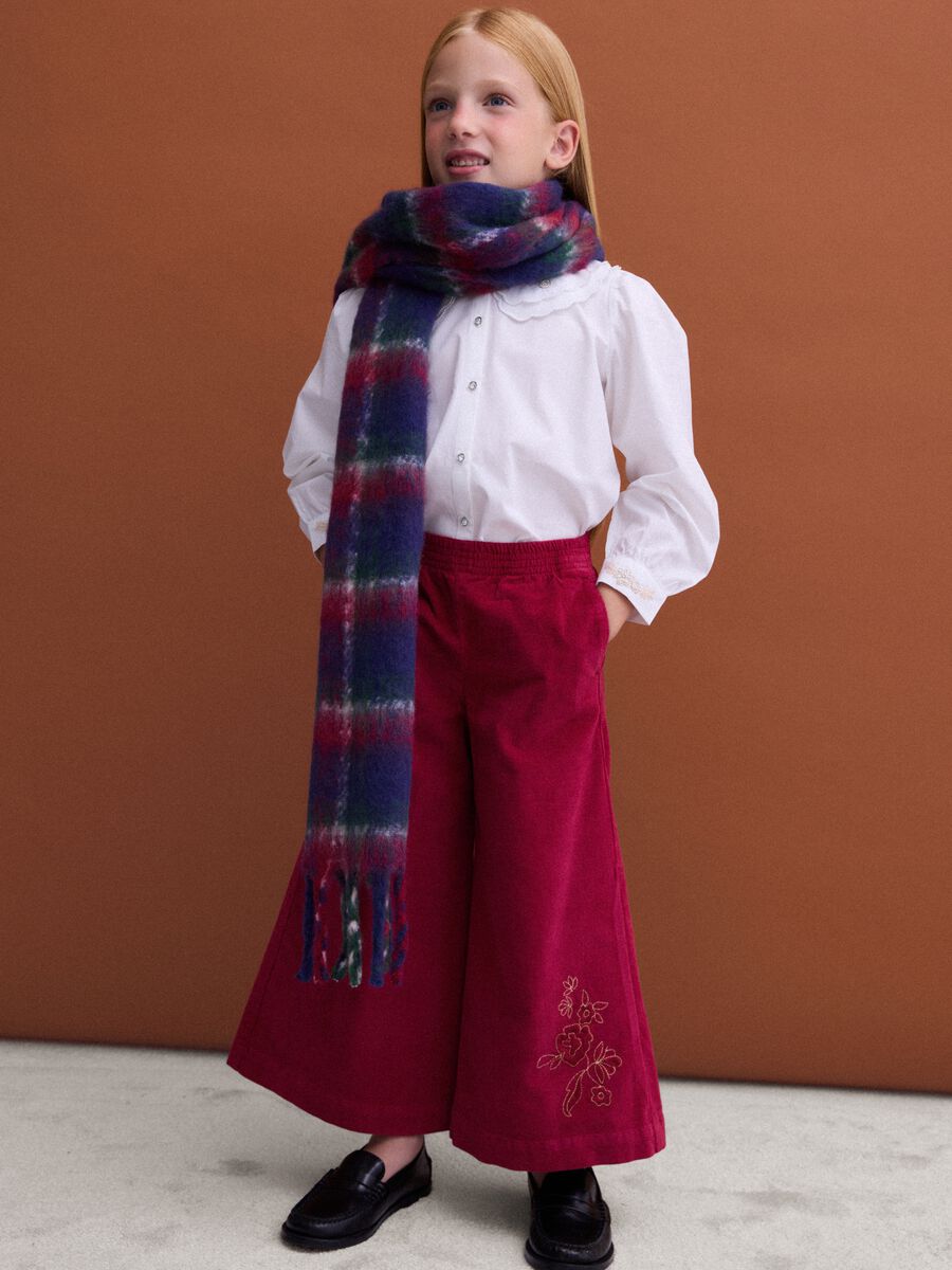 Pantaloni vellutati rossi wide leg in cotone elasticizzato con ricamo floreale_1