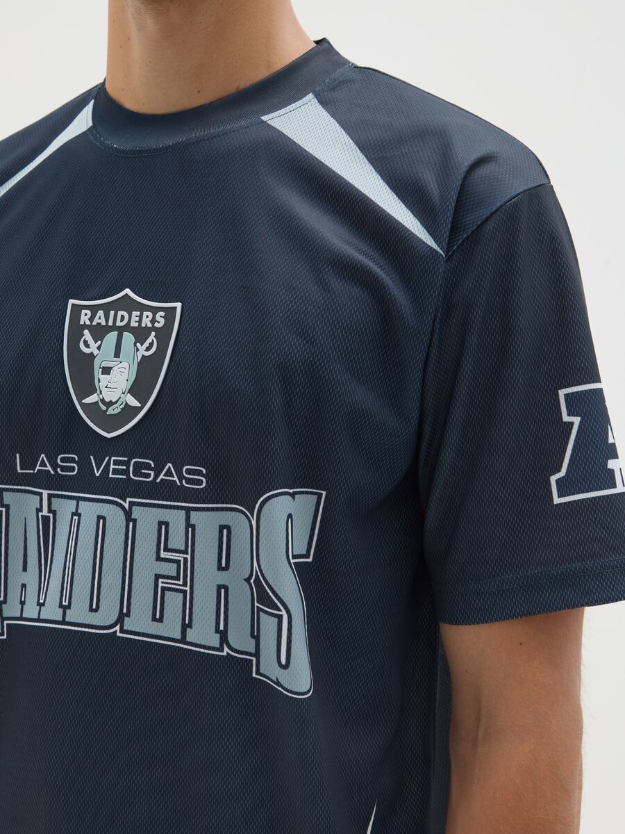 Blue T-shirt with Las Vegas Raiders graphics_3