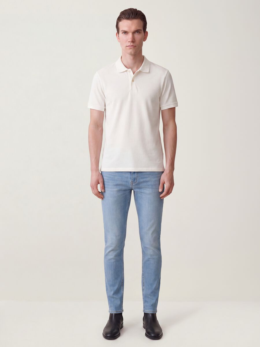 Jeans azzurri skinny in cotone elasticizzato_0