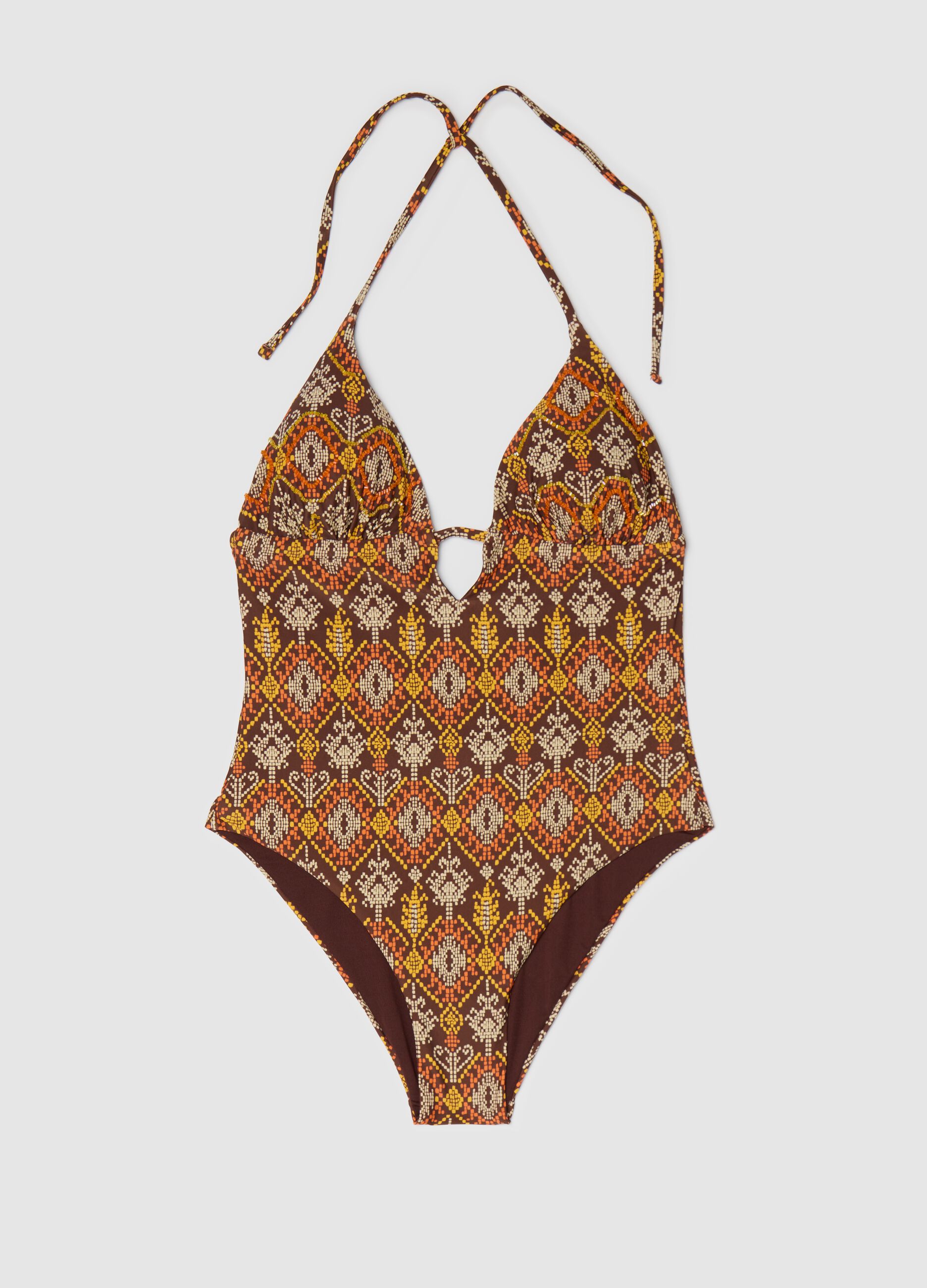 Costume intero da donna in tessuto elasticizzato con perline
