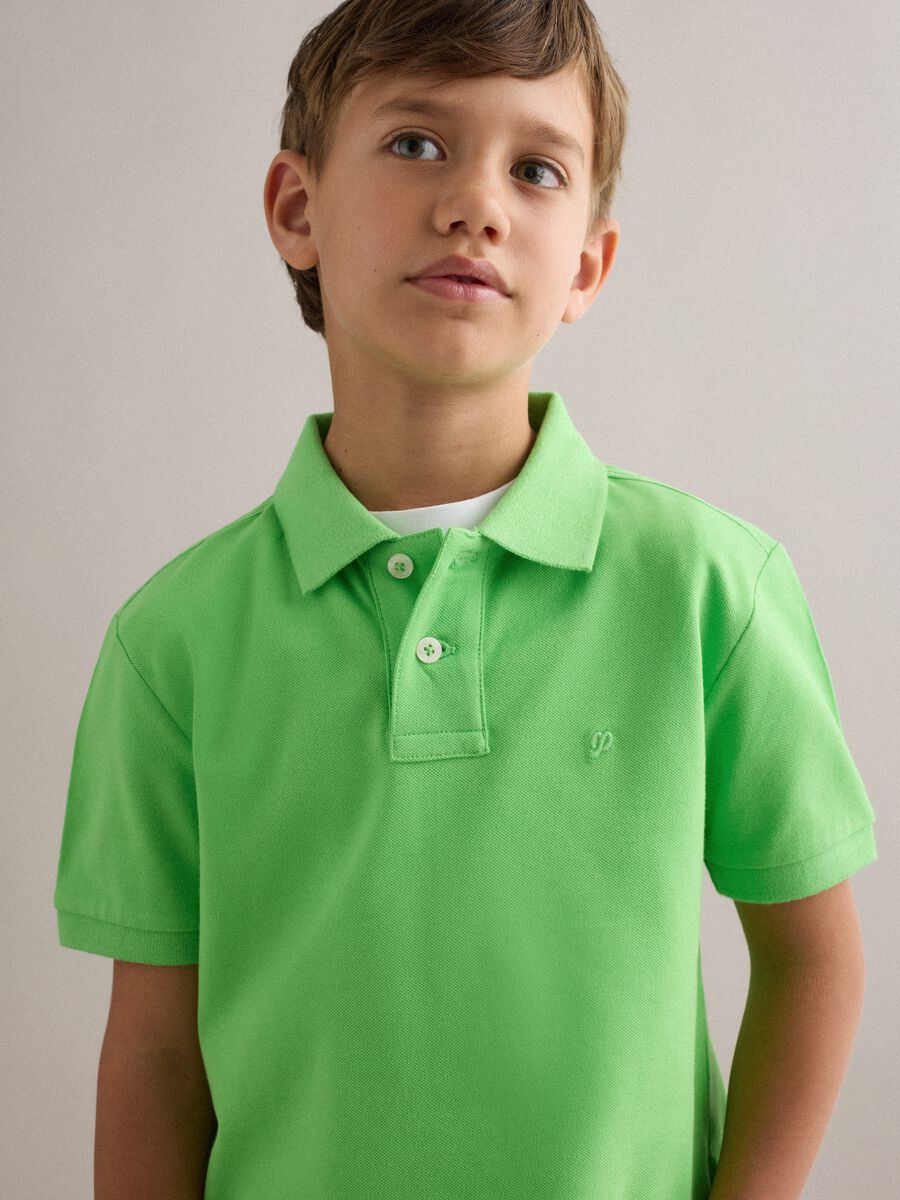 Polo in cotone elasticizzato verde da bambino regular fit_0