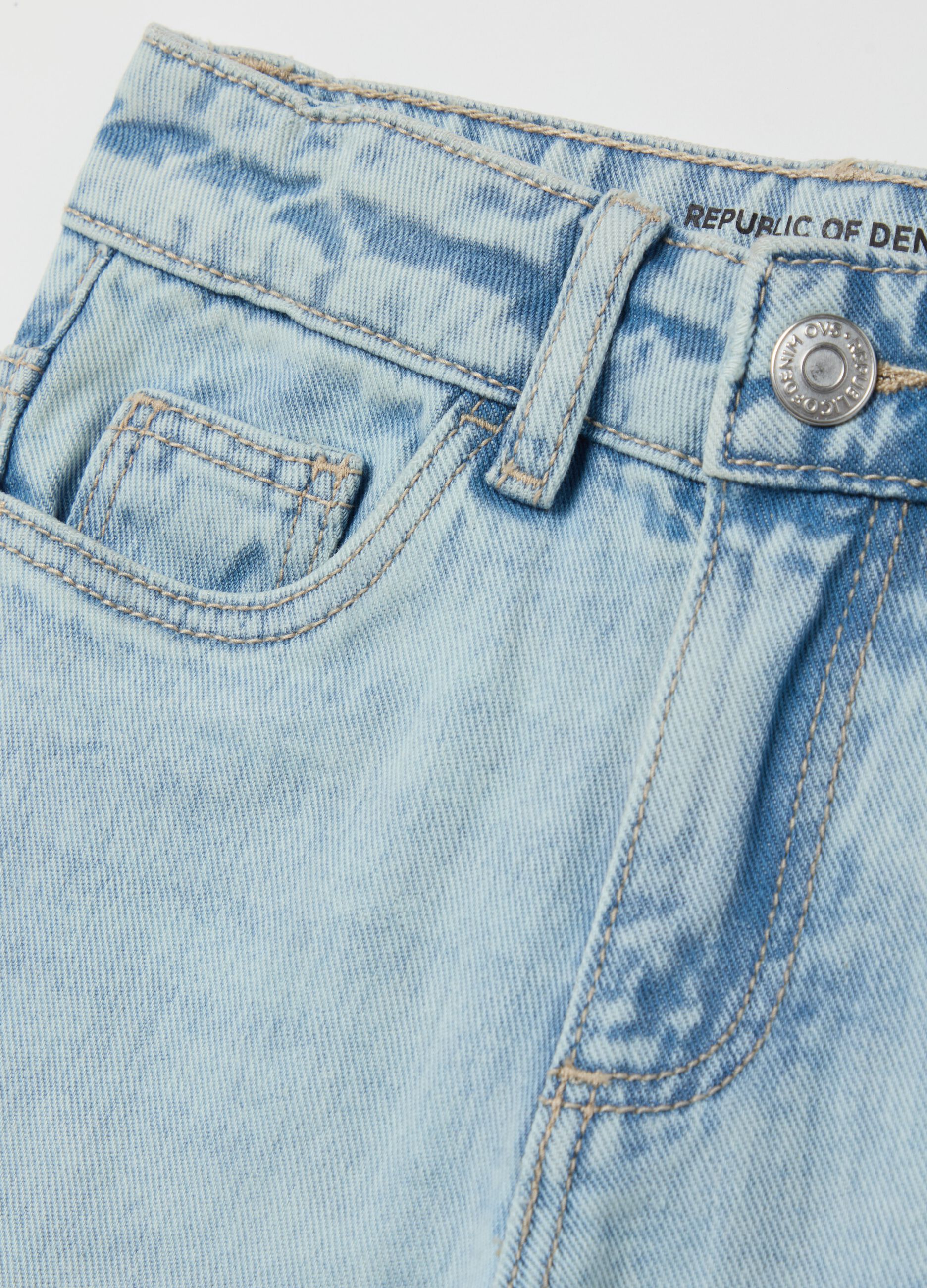 Flare-fit jeans with five pockets and butterflies embroidery