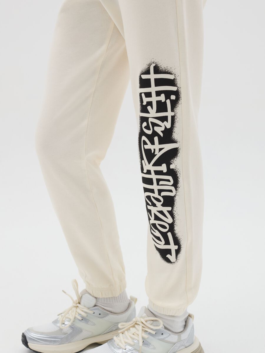 Joggers in cotone con coulisse e stampa_2