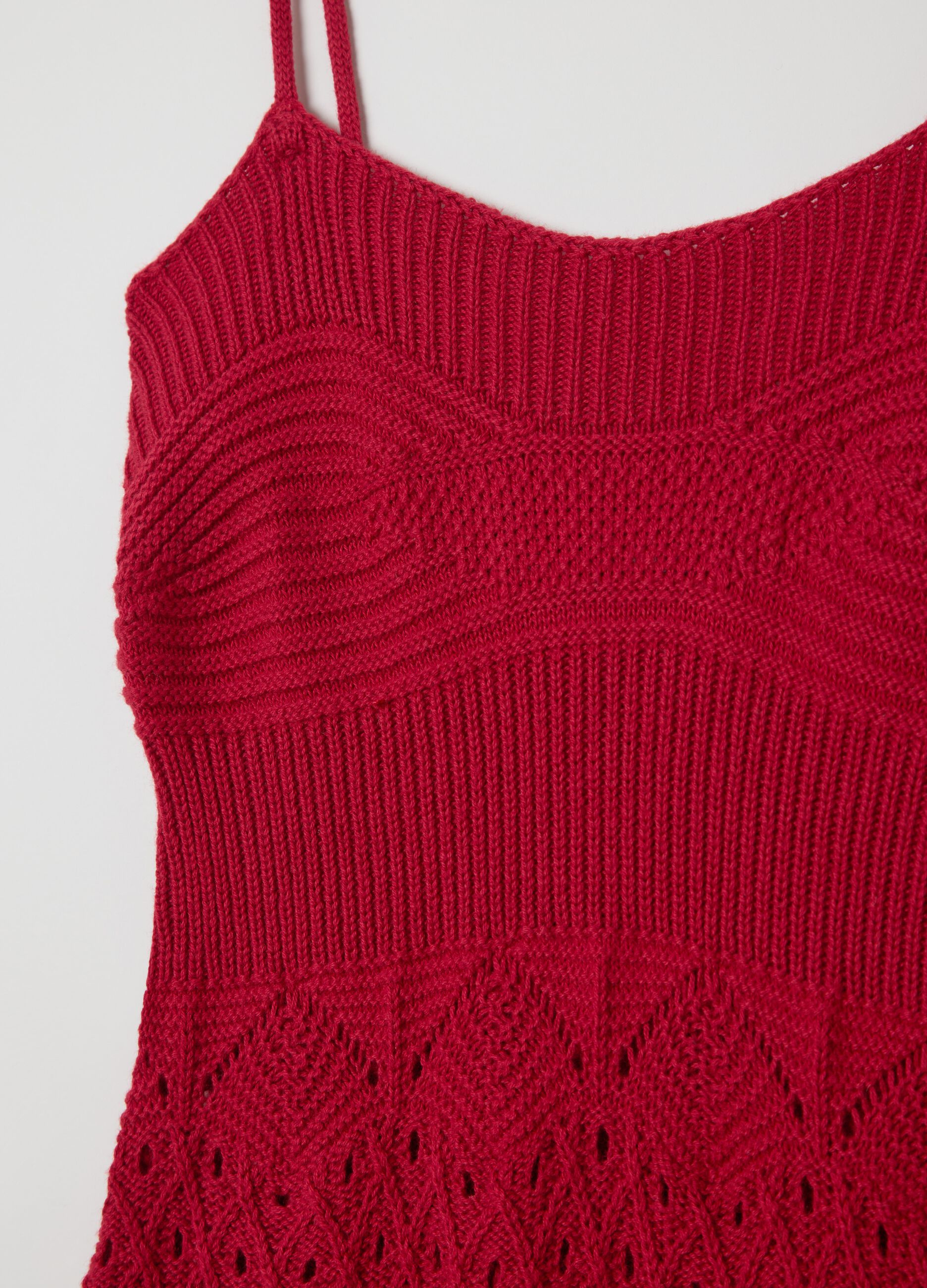 Long red dress in crochet knit