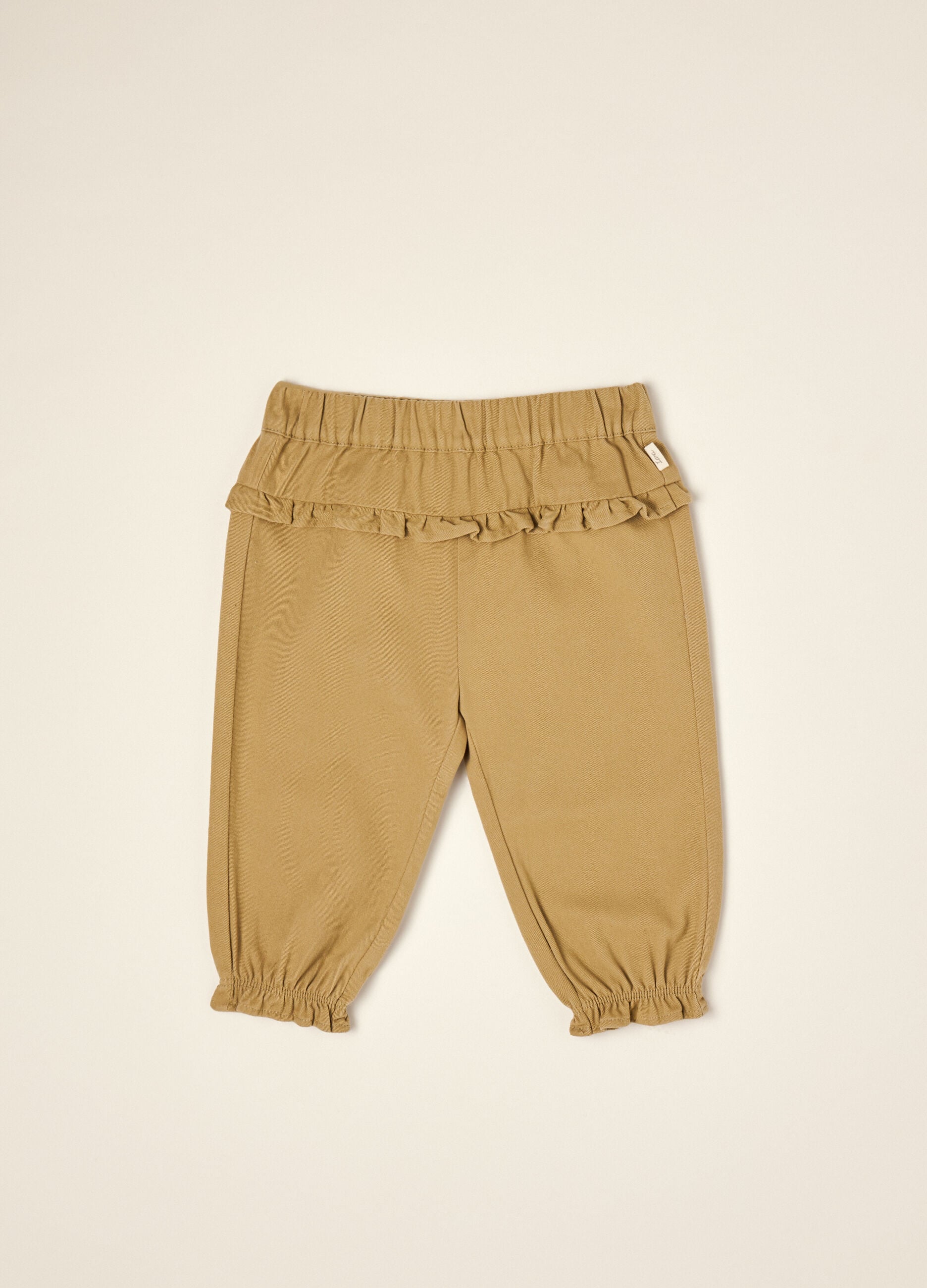 Beige pure cotton trousers with ruffle detail