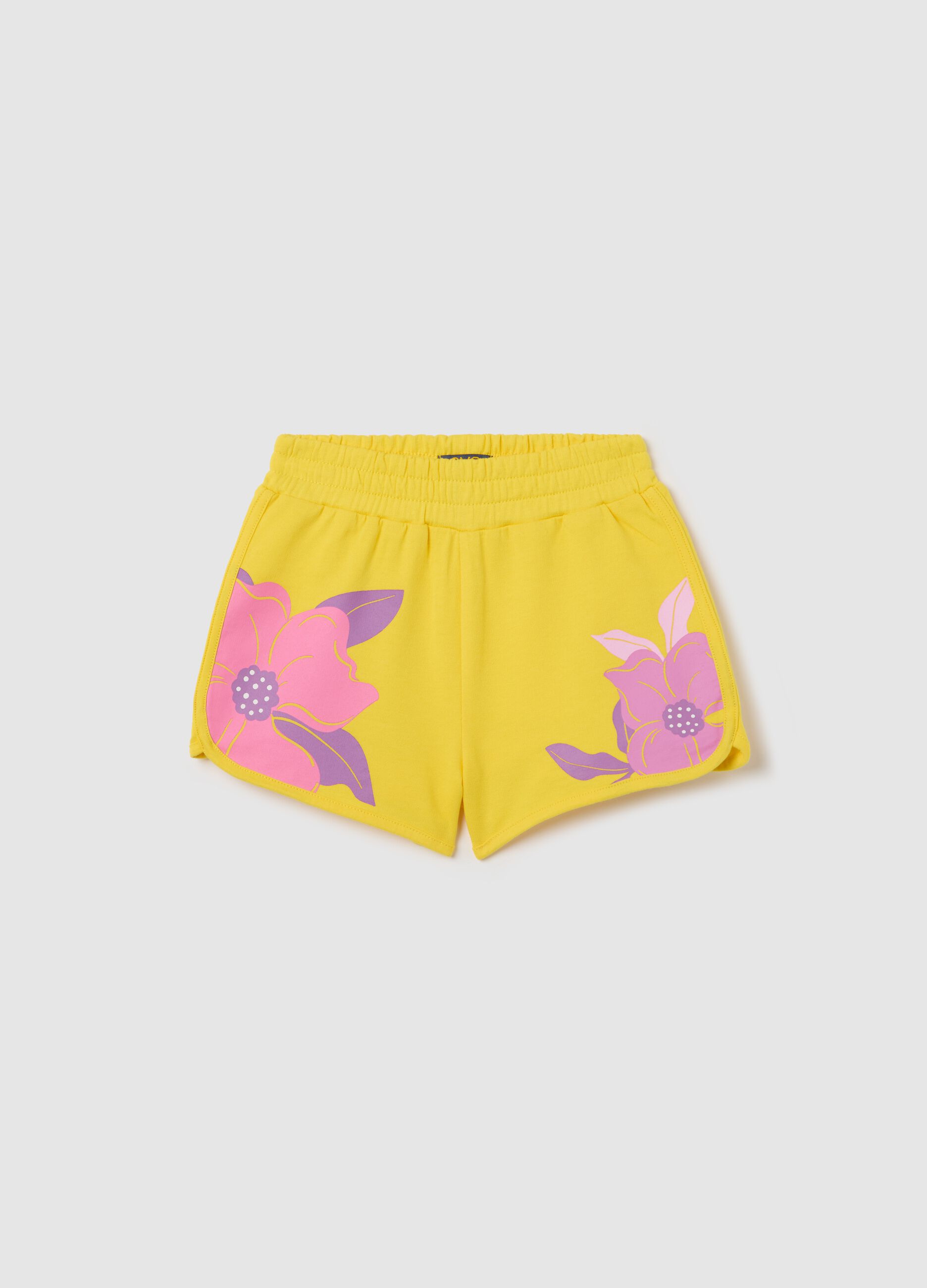 Yellow French terry shorts with print